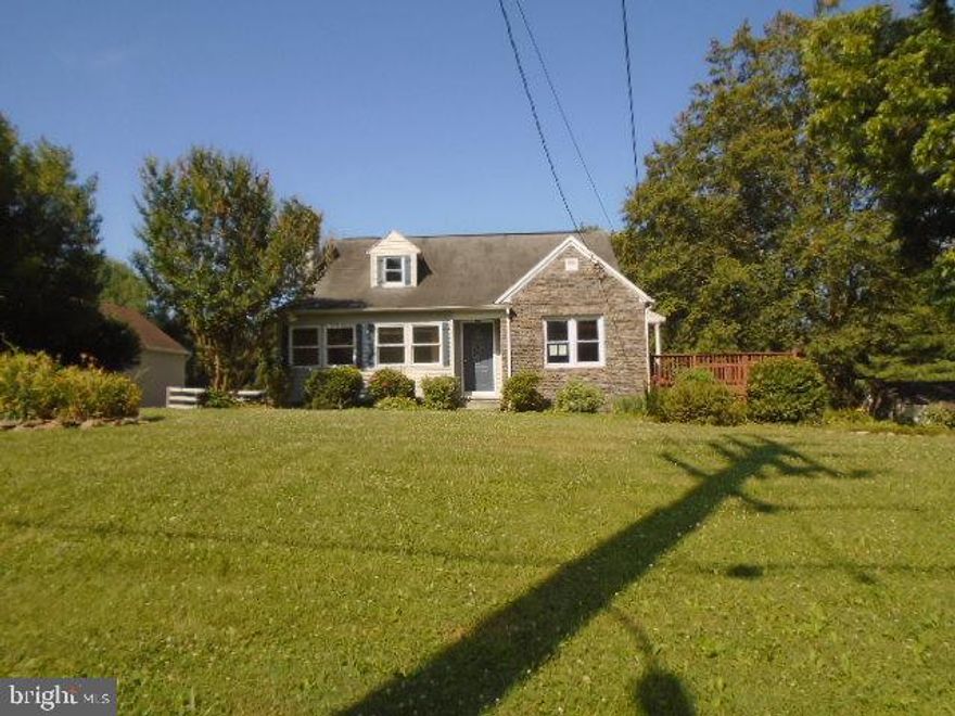 Enjoy the Country feel of this spacious Cape Cod sitting on .59 acres with rural views. 1 Car oversized garage  at end of driveway Partially fenced yard in rear.  Front and rear decks.  Sun filled living and dining rooms with hardwood floors. Stone Fireplace has pellet stove in living  room. Kitchen has lots of cabinet space and leads to rear deck.  Two bedrooms on main level and full bath. Upper level has 3rd bedroom and full bath.  Lower level is improved with rec room , storage area and 1/2 bath. Close to schools , shopping and Parks. Easy access to rt 24  to rt 95.