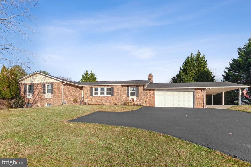 You'll love the convenience of one-level living in this rancher with a large, flat back yard in the Mount Hebron neighborhood. Enter to the open floor plan with the living and dining rooms, bright with large windows. The updated kitchen includes a breakfast area, and is open to the family room with a breakfast bar. The family room, which has dog-friendly luxury vinyl plank floors protecting wood floors, has a brick fireplace and sliding doors to the back deck. The bedroom wing includes a primary suite with a private bath that includes a double vanity, and a well-appointed walk-in closet. Two other bedrooms share the hall bath.  The finished basement  has a huge area with spaces for a home theatre and a pool table and game section. There's a large laundry room, partial bathroom, and a bonus room that could be a study, hobby room, or exercise studio.  The back yard includes a large deck, and a furnished cabana, as well as a storage shed. And take a look at the over-sized double garage, plus a carport for that third vehicle!