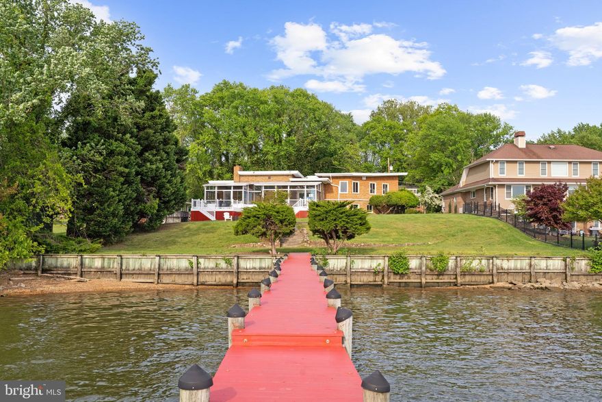 **DEADLINE is MONDAY May 8th at 10am for BEST AND HIGHST OFFERS. *** 

A ONCE IN A LIFETIME DREAM HOME!!!!  One of the BEST waterfront views of the Potomac River on the MARKET!

Experience the luxury of being close to nature.

Whether you are looking for your dream home, a vacation getaway, or a fantastic investment opportunity with excellent ROI potential to expand your real estate portfolio, we've got the ideal place for you. Welcome to your dream home! Located at 9501 Potomac Dr in Fort Washington, MD. and priced at 1.4 million, this gorgeous home is the epitome of indoor-outdoor living and has the potential of becoming the secluded, peaceful retreat of your dreams. Situated on the Potomac River in a quiet, mature community with no through traffic, it offers the peace and tranquility you deserve. 

We're confident you'll fall in love with this magnificent property as soon as you arrive at the address and gaze upon its modern brick construction and well-manicured landscaping. The delights continue as you walk through the front door and step on the polished hardwood floors of the sizeable welcoming foyer, and notice the amount of natural light and air that comes through the vast windows and bounces off the walls. 

This completely renovated home boasts four bedrooms and three full baths, with an in-law suite perfect for guests or extended family members. 

The sizeable gourmet kitchen is a true home chef's dream. Stylish and practical, it features lots of storage room in its ample white cabinets, modern appliances, a chic tiled backsplash, sparkling countertops, and a sizeable bar for cooking, eating, or enjoying pre-dinner drinks. Adjacent to it, you'll find a lovely breakfast nook, where you can enjoy casual meals with your family while enjoying the views of the well-manicured gardens. 

The sprawling great room/dining area is perfect for entertaining family and friends. It boasts an elegant fireplace that provides warmth and elegance to the space. Just imagine the amazing dinner parties you could throw!

The cherry on top is the incredible sunroom with vaulted ceilings that spans the width of the home. You can enjoy calm afternoons sipping a refreshing drink while taking in the stunning views of the river. 

Or enjoy the two beautiful decks that places you even closer to nature, to take in the panoramic views of the river. There are so many choices of serenity in this home to choose from.

Upstairs, you'll find the expansive main suite, boasting a deluxe ensuite bathroom, to maximize your privacy and comfort. The rest of the bedrooms are equally spacious and comfortable (one of them with a large walk-in closet), and they are serviced by a cleverly designed main bathroom with a deluxe bathtub. 

Finally, you'll find a finished basement with a utility room and an expansive area that could be used as a games room, at-home fitness center, or family room - the possibilities are endless! 

This home features top-of-the-line finishes and appliances that you'll adore, as well as postcard-perfect views of the river. Experience the peace and tranquility of living close to nature! The end-of-street location offers privacy and seclusion, while still being conveniently located near shopping and dining options. Restaurants and cafes are a short drive away. Just 15 minutes to Washington DC.

Don't miss out on this amazing opportunity to own a waterfront property in a prime location. Schedule your showing today and fall in love with your new home on the Potomac.
