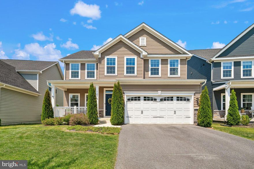 Wooded privacy and modern luxury combine in this immaculate 5-year-young home with 5 bedrooms and 4.5 baths, and located in the premier all ages section of popular Two Rivers backing to mature trees with peaceful wooded views.  The main level boasts attractive LVP flooring and neutral carpeting, a private room for the perfect office or main level bedroom, and a stunning gourmet kitchen featuring an oversized island with gleaming white Quartz countertops, espresso cabinetry, and chic subway tile backsplash. Entertain effortlessly in the open-concept family room with a cozy gas fireplace, or transition to the amazing outdoor spaces including the covered composite deck, the full fenced backyard, or the expansive hardscape patio, all with tranquil wooded views.  The upper-level owner’s suite is a true retreat with a tray ceiling, massive walk-in closet, and a spa-like bath with double Quartz vanity, soaking tub, and separate shower with custom tilework.  Three additional bedrooms of generous size are also found on the upper level, along with two additional upgraded full baths, and a convenient upstairs laundry room.  The finished lower level provides an ideal space for guests with a true 5th bedroom with full sized egress window and a 4th full bath.  A spacious rec room with recessed lighting and walk out slider to the private backyard and a storage area completes the lower level. This turnkey home is ready for you, along with the unparalleled amenities of Two Rivers (outdoor pool, tennis / pickleball courts, walking paths, biking trails, dog park, playground, basketball courts, volleyball courts, and clubhouse)!