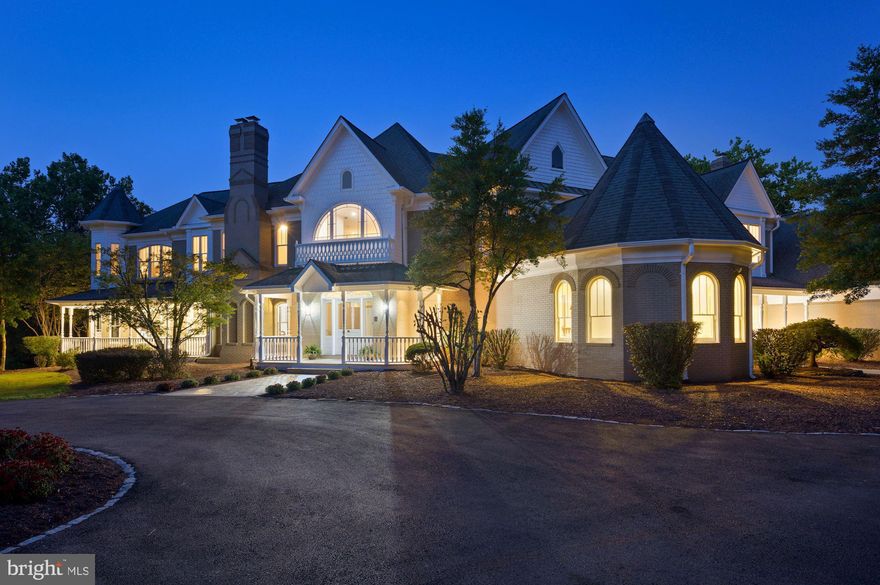 FIRST SHOWINGS at SUNDAYS OPEN HOUSE from 2pm to 4pm. Welcome to this elegant residence resplendent on a lush, landscaped 2 acre lot.   Enjoy coffee or entertaining on your wrap around porch, with views of the gardens and designer landscaping.  Top of the line finishes include beautiful hardwoods throughout, an elevator, a grand staircase with overlooks, and generous room sizes.  Over 11,000 square feet of custom designed space offers 6 bedrooms with 7 full baths and more than ample room for 3 home offices, too!   In addition to the formal living room and dining room, a light filled library with fireplace and huge family room all enjoy high ceilings with views to the outdoors.  A gourmet kitchen with center island and top of the line appliances is a cooks dream.  The breakfast room overlooks the grounds and offers wonderful space for informal entertaining too. Off the kitchen a private hallway on the main level leads to a sumptous owners or guest suite with sitting room and private bath opening to the wrap around balcony with pastoral views of the grounds. The upper level provides a second owners suite with sitting room, private bar area, huge walk in closet,  his and her baths, and a corner overlook onto the grounds.   Three additional bedrooms all with ensuite baths complete the upper level.  The back staircase leads to the finished lower level with bar area, music area, pool table room, game room, wine closet, bedroom number 6 and bath number 7 complete with sauna.   A main level three car garage has space as if it were a 4 car garage. Welcome home to a wonderful residence designed for easy entertaining flow and indoor and outdoor spaces that will appeal to all ages.  Hurry, this one is special!