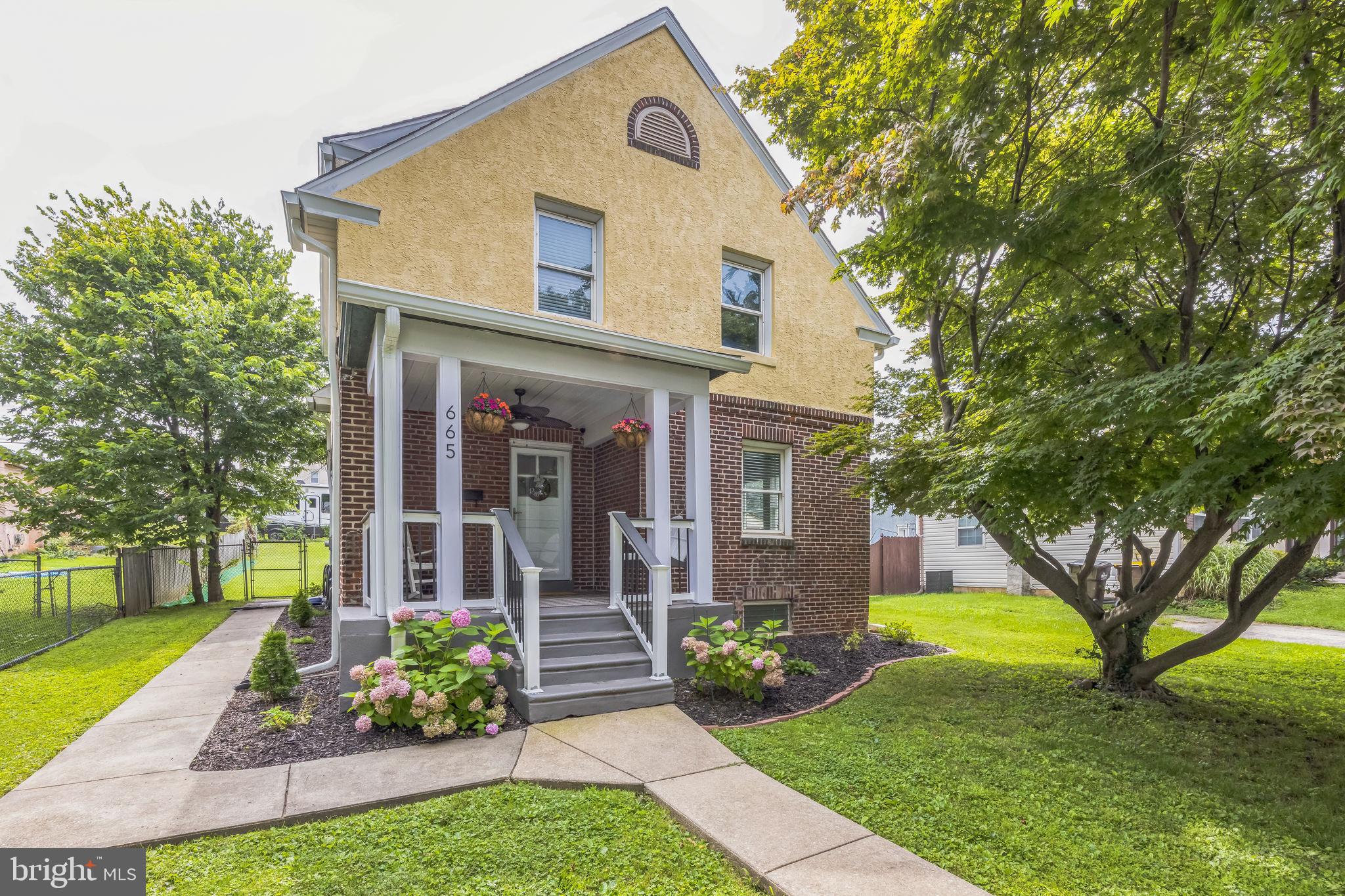 Welcome home to 665 U Street, where you'll be greeted by a lovely front porch overlooking a stunning maple tree and playground across the street. Step inside a welcoming foyer featuring gleaming hardwood floors and a convenient coat closet. The foyer flows seamlessly into the main living area, bathed in abundant natural light and offering generous space for both living and dining arrangements. Beyond, the kitchen is a true highlight, boasting stainless steel appliances, ample cabinet storage, and charming wainscoting that adds character. Completing the main floor is a spacious mudroom, equipped with washer/dryer hook-ups, and a beautifully renovated half bath for added convenience. The backyard is an entertainer's dream, featuring a spacious composite deck perfect for outdoor gatherings, and a large, fenced yard complete with a storage shed. Upstairs, you'll find four bright and inviting bedrooms, along with a full bathroom showcasing a tiled tub/shower combination. The unfinished basement provides substantial additional space, ideal for storage, a home gym, or future customization. Additional features include: newer sewer main (2022); all new electric (2022); basement waterproofing and brick pointing (2022); 3 mini splits (2022); newer water heater (2023); newer dishwasher, refrigerator, and water line (all 2023); newer roof (2024), newer deck (2024), custom closet in nursery bedroom (2024). With easy access to the Conshohocken and Spring Mill train stations, the high speed line at Gulph Mills Station, I-76 and I-476, commuting throughout the greater Philadelphia area is a breeze!