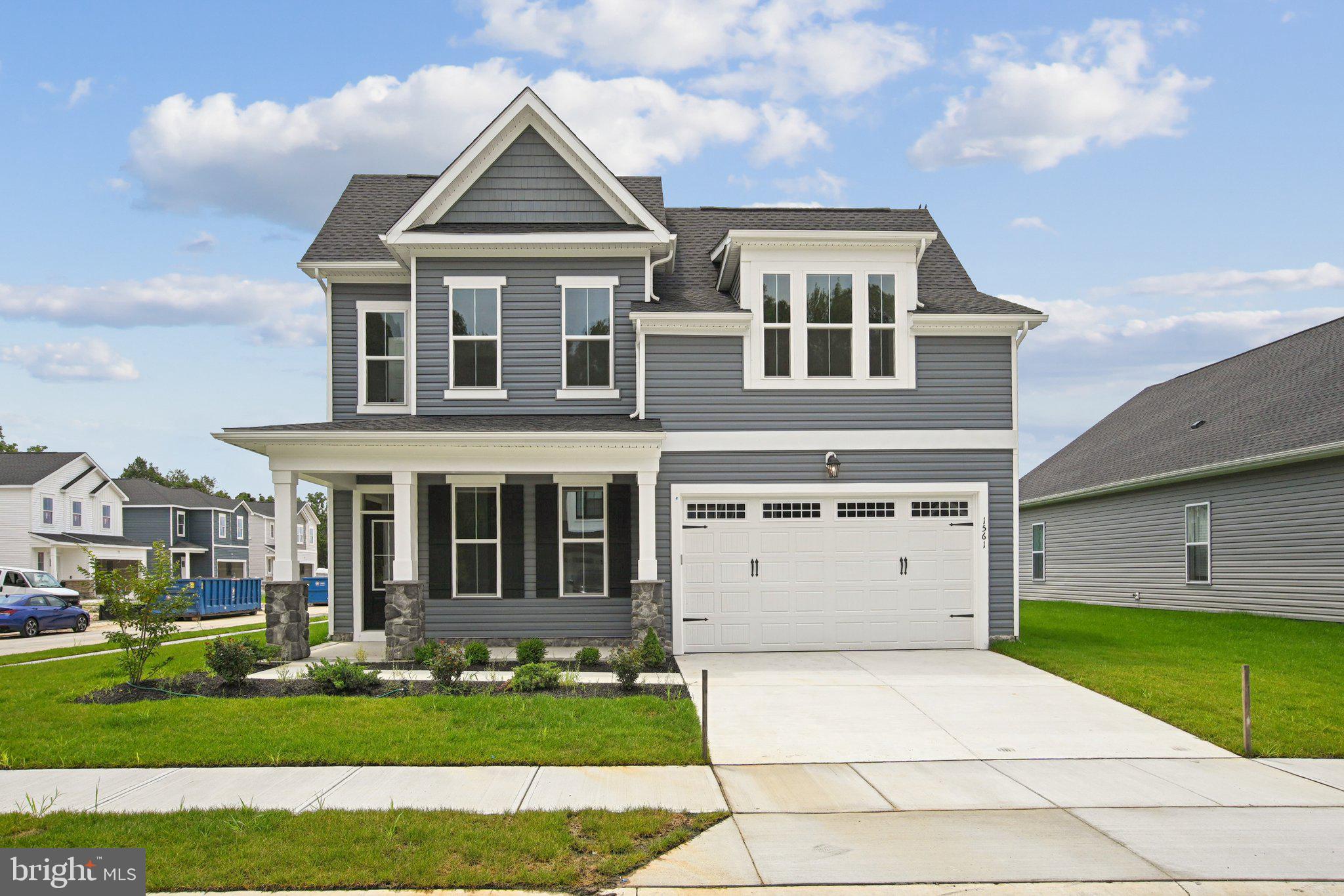 Brand New Torrington with Main Level Primary Bedroom is under construction and nearly ready for move in! A covered porch extends a gracious welcome, leading you into a home where thoughtful details abound. Throughout the home, the upgraded Artisan interior trim package adds a touch of elegance and sophistication to every room.
Upon entering, discover a flexible living space that can effortlessly transform into a distinguished study/den or a vibrant playroom to meet your evolving needs. The heart of this residence lies in its open-concept kitchen, harmoniously connecting the dining room and family room – an ideal setting for hosting gatherings and creating lasting memories. The main level boasts a striking volume ceiling, and abundant windows enhancing the sense of spaciousness . The kitchen boasts a central expanded eat-in island, Carrara Morro quartz countertop, and a gourmet stainless steel appliance package with a hood, complemented by Glacier Gray kitchen cabinets and sophisticated matte black kitchen hardware.
Retreat to the main-level primary suite, strategically positioned for utmost privacy. This serene haven includes two spacious walk-in closets and a deluxe primary bathroom featuring a frameless shower door, Carrara Morro quartz countertops, and upgraded cabinets.
Ascend to the upper level which features an alternate layout, and a versatile loft awaits, offering a flexible space for relaxation or recreation. This level also features two additional bedrooms and a full bath. The Torrington offers a seamless blend of luxurious features and practical design, creating a residence that truly feels like home.
Located in Trappe, MD just minutes from Easton, MD, Lakeside at Trappe is an amenity-rich community that allows for daily recreation and easy access to all your needs in Easton, Cambridge, and beyond. Community currently offers a pool, bathhouse with fitness room, ping pong, corn hole, playground and sports courts plus a Bark park. An immersive lakeside experience also in the works!
Interior photos are of model while construction is ongoing