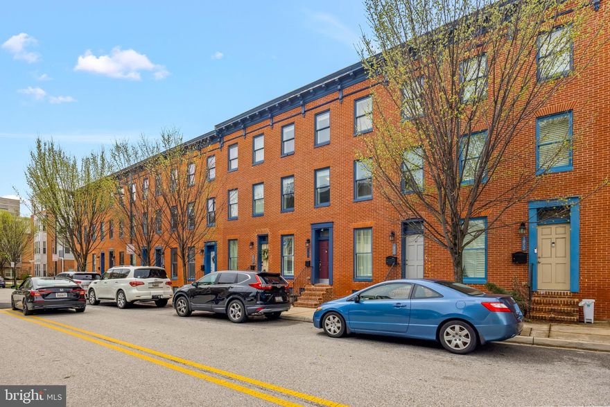 Low Property Taxes until 2027 with the CHAP TAX CREDIT, NO HOA, PARKING PAD.

Modern comfort meets city convenience at 1018 McDonogh Street, a stylish and spacious three-level townhome tucked away in the heart of Eager Park with a private off-street parking pad and low annual taxes!

This 3-bedroom, 3.5-bath home offers contemporary living just seconds from the Johns Hopkins Medical Campus and within easy reach of city transit, dining, and much more! Designed for both functionality and style, the home features beautiful hardwood flooring throughout, a gourmet eat-in kitchen with granite countertops, custom cabinetry, and stainless steel appliances and secondary sink.
Upstairs, generous bedroom suites provide comfort and privacy, while the top-level rooftop balcony offers beautiful west-facing views — a perfect retreat to enjoy Baltimore’s skyline and evening sunsets. The whole-home water filtration system, spotless basement with abundant storage, and private rear parking pad further enhance the home’s livability and long-term value.


With low annual taxes, no HOA fees, and access to generous grant programs, this home offers unmatched value in one of East Baltimore’s fastest-growing communities. Move-in ready and waiting for you to make it yours!