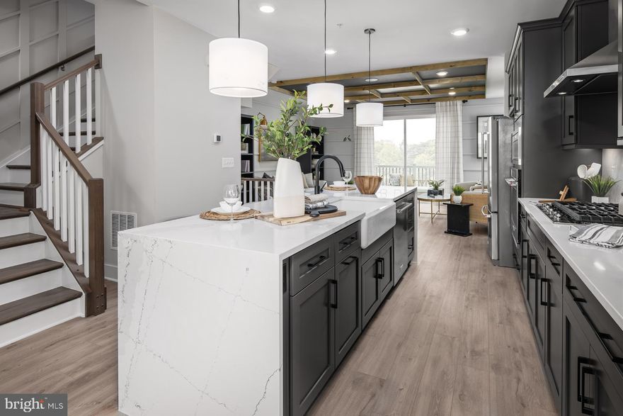 **OFFERING UP TO $72,500 IN FLEX CASH INCENTIVES WITH USE OF APPROVED LENDER AND TITLE! Lower your price, cover your closing costs, or buy your rate down**
Welcome to the Rockland, an open-concept luxury townhome with modern finishes and an urban aesthetic! Enter the home through the main entryway or the rear load 2-car garage, both leading into a spacious study with a full bathroom. Ascending to the second level, you will discover the main living space comprised of a sunlit family room, a generously sized chef kitchen, and a dining room complete with a sliding glass door and rear deck access. With an oversized island and premium Cafe Appliances, this space is truly chef worthy. When it's time to relax, retreat to the primary suite, a private getaway that can be found on the third level of the townhome. Which includes a large walk-in closet and a spa-like bathroom that features dual vanity sinks and a seated Roman Shower. The laundry room is also located on the third level, conveniently accessible from the primary suite and secondary bedrooms. Enjoy stunning views from the fourth level's loft deck, a private outdoor living area perfect for entertaining. Flexible by design, the fourth level offers open 14 X 28 entertaining recreation space, and Wet Bar. ***THIS PROPERTY MAY QUALIFY FOR THE BROWNFIELD TAX CREDIT. WHICH COULD RESULT IN UP TO A 70% REDUCTION IN ANNUAL CITY PROPERTY TAXES FOR TEN YEARS***  See sales consultant for more information. *Photos may not be of actual home. Photos may be of similar home/floorplan if home is under construction or if this is a base price listing.