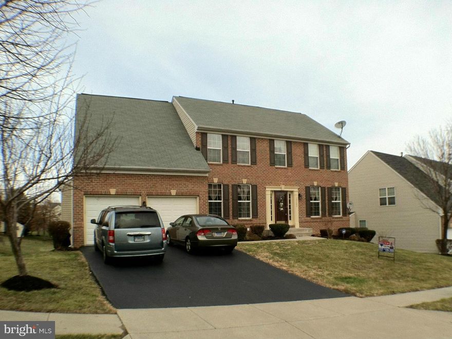 3 finished LVL brick colonial on prime lot - 5BR/3.5BA, spacious MBR w/sitting area, full walk-in closet, luxury MBA w/separate shower,jetted soaking tub. LL has 5th bdrm, full bathroom, rec room, wet bar & level walkout to brick patio. Formal LR/DR, full country KT, gas FP in FR. Double 12x12 decks - one enclosed, one open. Whole house fan, water softener and power generator hookup. Clean&bright!