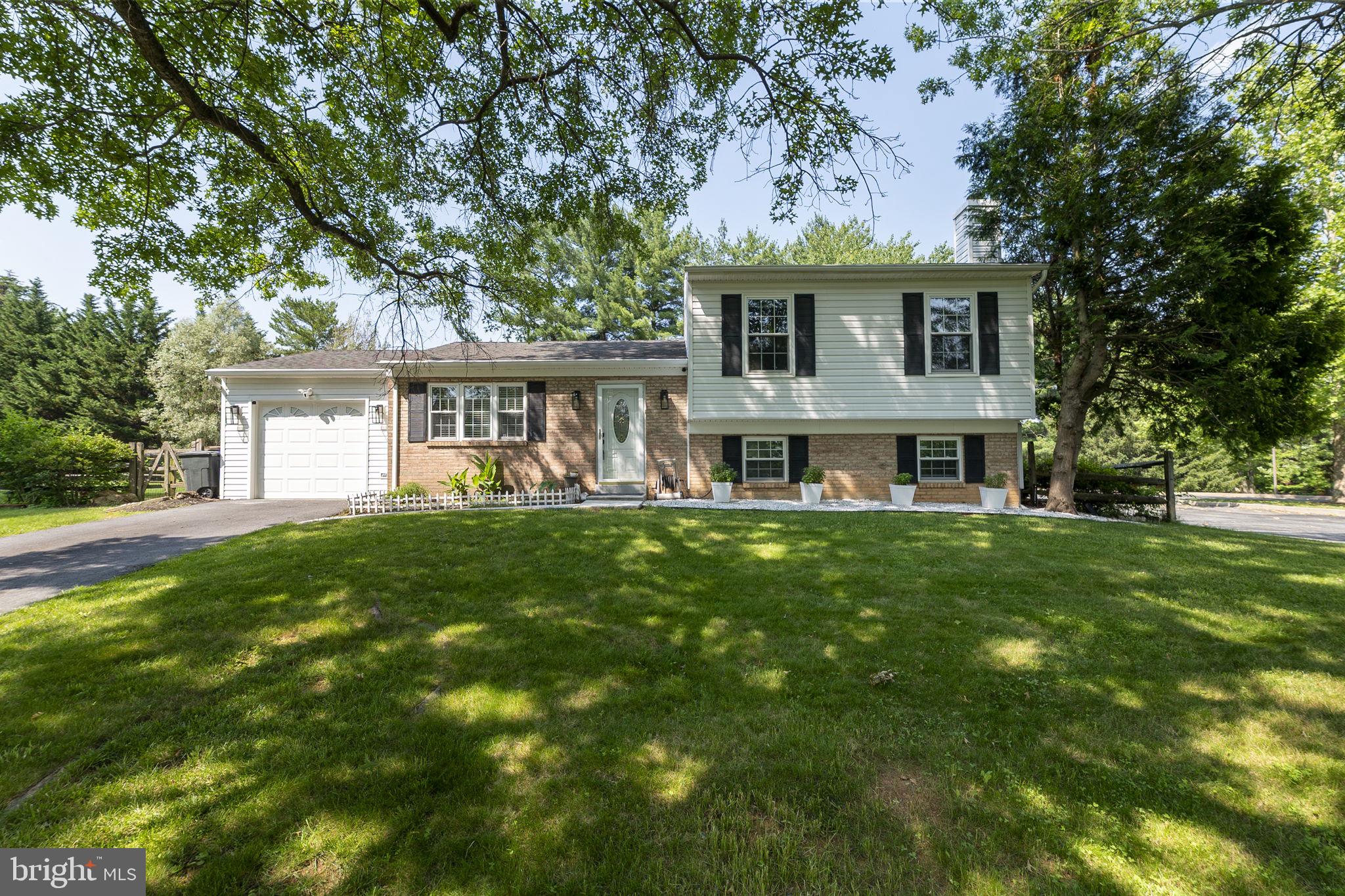 PRICE IMPROVEMENT!!! Open House this Sunday 11-1pm. One of a kind 5 bedroom 3.5 bath split level home on level, quarter acre corner lot. Main level hardwoods beam throughout open concept living, dining and kitchen. BRAND new main level bedroom and full bathroom. Kitchen features upgraded showcase cabinetry. Upper level has primary suite and additional 2 bedrooms and 1 full bath. Both upper level bathrooms have refreshed modern vanities and lighting. This home has been meticulously cared for with newer HVAC, roof and all plumbing lines converted from cooper to flexible and more durable polyethylene piping. English lower level has true 5th bedroom, family room and half bath. Large No Maintenance Deck In Fully Fenced FLAT Back Yard. Home Backs To One Of The Two Community Pools, Tennis Courts And Playground. Community has many paved paths leading to Seneca Lake and Black Hills Regional Park.
