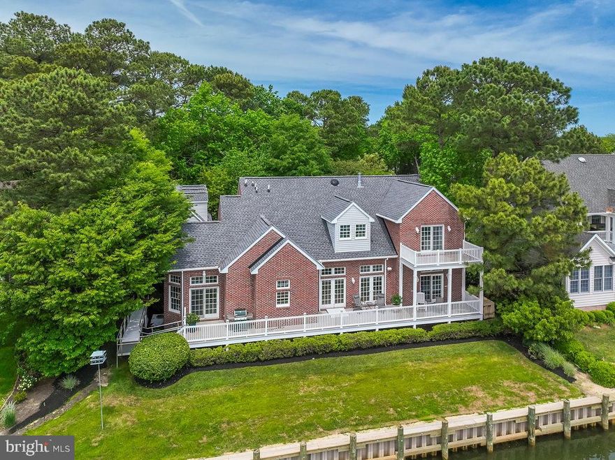 A rare find—welcome to 536 Yacht Club Drive, proudly owned by its original owners and located in the highly sought-after Colonial Village area of Ocean Pines. This exceptional waterfront property sits on an oversized 0.51-acre lot with a new vinyl bulkhead (2024) , offering beautiful views and outstanding boating access to open water.

Built with care, this all-brick residence offers over 3,500 square feet of living space with an open floor plan designed for relaxed coastal living. All bedrooms feature their own private bathrooms, and a pretty sunroom provides a peaceful spot to relax and take in the serene waterfront setting. Quality Andersen windows and doors enhance the home's energy efficiency and timeless style.

Recent upgrades include a new roof (2023), two brand-new geothermal HVAC systems (2025), an encapsulated crawlspace, and a whole-house generator for added peace of mind. The home also features two tankless water heaters, 400-amp electrical service, and a cozy gas fireplace in the main living area.

The oversized three-car garage includes a 500-square-foot guest apartment above with a full bath and mini kitchen—perfect for extended family, guests, or a private office. Just steps from the Ocean Pines Yacht Club, Pine Point Provisions and 2 pools, This location is perfect for those seeking the ultimate coastal lifestyle.

Whether you're searching for a primary residence or a  waterfront retreat, this beautiful home is truly one of a kind. Furniture is negotiable. Schedule your private tour today!