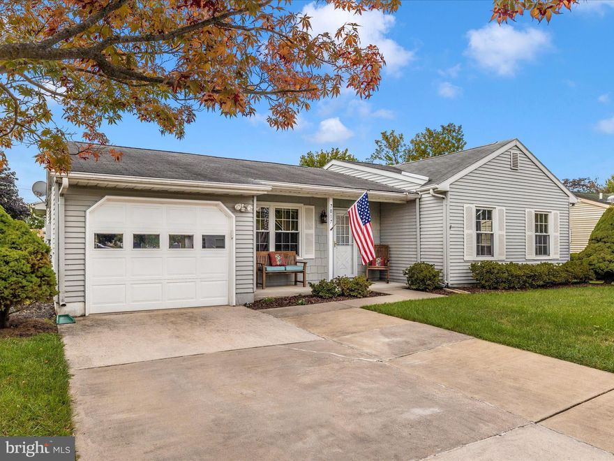 Welcome home to the sought-after 55+ community of Crestwood Village.  Located in the heart of Frederick, this spacious single-family home (Newbury Model) is on one of the larger lots in the neighborhood.  It is adjacent to a spacious open area that not only gives you great unimpeded views of nature, but also privacy.   The sunroom addition is a great flexible living space that allows for comfortable enjoyment of the local wildlife, regardless of the weather.  With over 1400 square feet, this home is loaded with natural light and offers an open living experience. The fully renovated master bath has a tile floor, a tiled walk-in shower, and a vanity with ample custom storage that is sure to impress.  Freshly painted, with custom molding throughout.  This home is well-maintained and offers many wonderful surprises, including upgraded raised panel doors in the owner's bedroom.   The large rear patio, with a power retractable awning, is perfect for outdoor solitude.  Vinyl-clad windows throughout and central HVAC with electric baseboard heat for extra coziness. Even a new water heater. An oversized parking pad allows for side-by-side parking with plenty of room out front.  Nothing to do but move right in and make it yours!