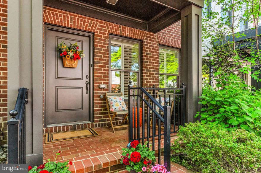 Welcome to 227 West Street: where historic charm meets modern elegance in the thriving Murray Hill neighborhood. This upscale townhome offers a rare opportunity to own a beautifully designed residence in one of the most walkable, culturally rich neighborhoods in the city.

Thoughtfully built in 2013 by Bozzuto, this 3-bedroom, 3.5-bath home blends contemporary comfort with timeless appeal. Step inside to find a home office or gym, overlooking your quaint front porch and fenced garden.  Walk upstairs to newly installed luxury floors, oversized windows, built-in speakers, and a seamless open-concept layout perfect for both everyday living and entertaining. The gourmet kitchen features stainless steel appliances, granite counters, a balcony perfect for grilling, and a large island that flows effortlessly into the dining and living areas.

Upstairs, you’ll find a spacious primary suite with a spa-like bath, plus two additional bedrooms ideal for guests or a home office. The top level boasts another family room, perfect for quiet reading or an additional office setting. The private rooftop deck offers sweeping views of downtown Annapolis—an ideal setting for morning coffee, evening cocktails, and a perfect view of the Blue Angels Commissioning Week Show!

With an attached garage, additional reserved parking, and low-maintenance living, this home offers the perfect blend of luxury, location, and lifestyle.

Outside your front door, enjoy the vibrant energy of West Street: art galleries, chef-owned restaurants, coffee shops, and live music venues are just steps away. You’re also minutes from City Dock, the Naval Academy, and commuter routes to D.C. and Baltimore - making this the quintessential spot for professionals who value access without compromise.

227 West Street isn’t just a home - it’s a statement. A place to connect, grow, and thrive in the heart of Maryland’s capital.