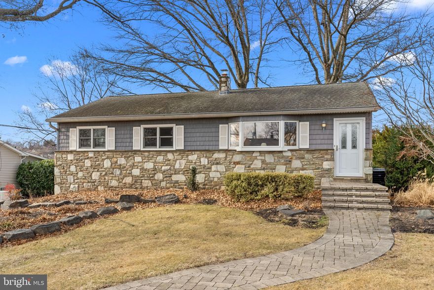 This 3 bedroom, one and a half bath ranch style home been customized with many beautiful upgrades.  Starting with great curb appeal and a paved walkway the lovely landscaping will be appreciated at Winter's end. The bright and cozy living room has wall to wall carpet over hardwood flooring. The kitchen has been remodeled with abundant custom cherry cabinetry, granite counters, over and under accent lighting  and upgraded stainless appliances, including a Thermador gas stove with warming racks. There is a huge picture window overlooking the three season room and view of the pond. Three nice sized bedrooms all feature double closed along with 2 additional hallway closets.  The hall bath is in good condition and has stood the test of time! There is hardwood flooring and custom trim to compliment the Pella windows throughout the main level.   The lower level features a beautifully finished family room, half bath and laundry room, as well as access to the oversized 2 car garage. The rear yard is an oasis of tranquility with the koi pond, waterfall and abundant lush landscaping. Hurry to see this gem in the  sought after Hampton Hills area of Warminster.