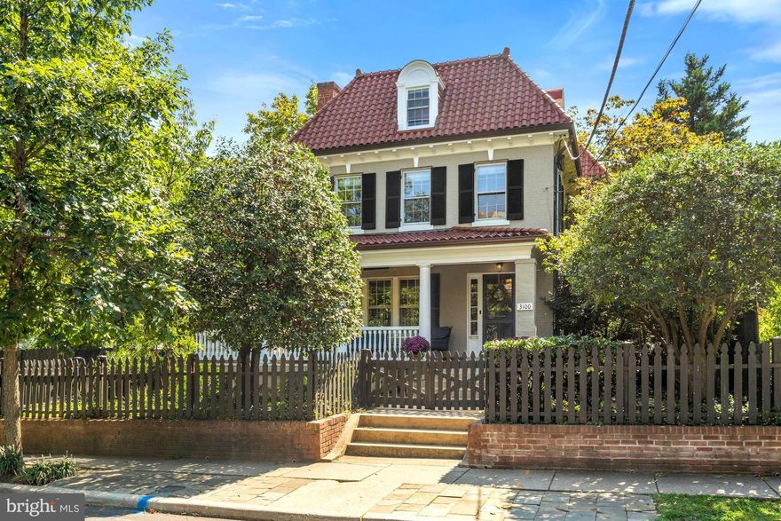 This stately 5 bedroom, 3 full bath, 2 half bath, 1923 French Empire Revival detached residence with its rich terra cotta barrel tile roof and sweeping wrap around porch depicts the classic and traditional style of the lovely Woodley Park neighborhood. The interior of the home presents a perfect combination of original details and modern conveniences. The first floor features  high ceilings and hardwood floors throughout and includes a large formal living room with fireplace and french doors, a formal dining room comfortably seating 10 guests  which opens through french doors to a dramatic family room comprised of floor-to-ceiling walls of glass, as well as, two sets of french doors leading to a generously sized rear deck. Opposite the dining room and also open to the family room for ease of living and a wonderful flow for entertaining is the newly renovated gourmet kitchen featuring top-of-the-line appliances such as  a large Subzero side-by-side refrigerator freezer with water and ice on door; Wolf: wall oven, steam oven,  microwave  and 5-burner gas cooktop ; and a Bosch dishwasher. The kitchen has a center island seating 3-4 guests and includes a vegetable sink and additional cabinetry below. There is an abundance of  rich blue cabinetry and along with  all the major kitchen appliances this ultimate gourmet kitchen offers additional luxury amenities such as a Subzero wine fridge, Subzero separate ice maker and an above cooktop pot filler. A powder room tucked away just beyond the foyer provides necessary privacy. The second floor includes a luxurious owners suite with a large bedroom with 5 windows yielding 3 exposures, a walk-in-closet and two seating areas. A newly renovated spa-like owners bath features sleek patterned ceramic tile flooring, designer lighting including a contemporary round mirrored chandelier,  an oversized frameless glass steam shower with rain shower head, multiple body sprayers, overhead shower head and hand sprayer and an architecturally interesting free standing tub. For ambience,  there is a wall- mounted remote control electric fireplace, as well as, a flat screen tv. A dual vanity with ample storage and separate water closet with water conserving flush complete this room. Two additional bedrooms (one currently used as an office with walls of windows)  lie opposite the owners suite and include a renovated en-suite bathroom with a bath/shower combo. For convenience, there is a full-size Maytag stacked washer/dryer and additional storage on this floor. On the third floor are two more bedrooms, one with a large walk-in-closet and roomy balcony plus a renovated third full bath complete with skylight. The basement provides a second pair of Maytag full-size, side-by-side washer and dryer along with additional storage, utility closet, separate side entrance and powder room. Attached is a two-car garage with a car port for additional several car parking.  The exterior includes a large deck and an expansive flagstone side yard with attractive brick wall and metal gates and a whole house generator. Also, newer to the house is a two zone a/c system, ring doorbell entry and Schlagg electronic lock system, as well as, Sonos.  ESTATE- SOLD "AS IS"