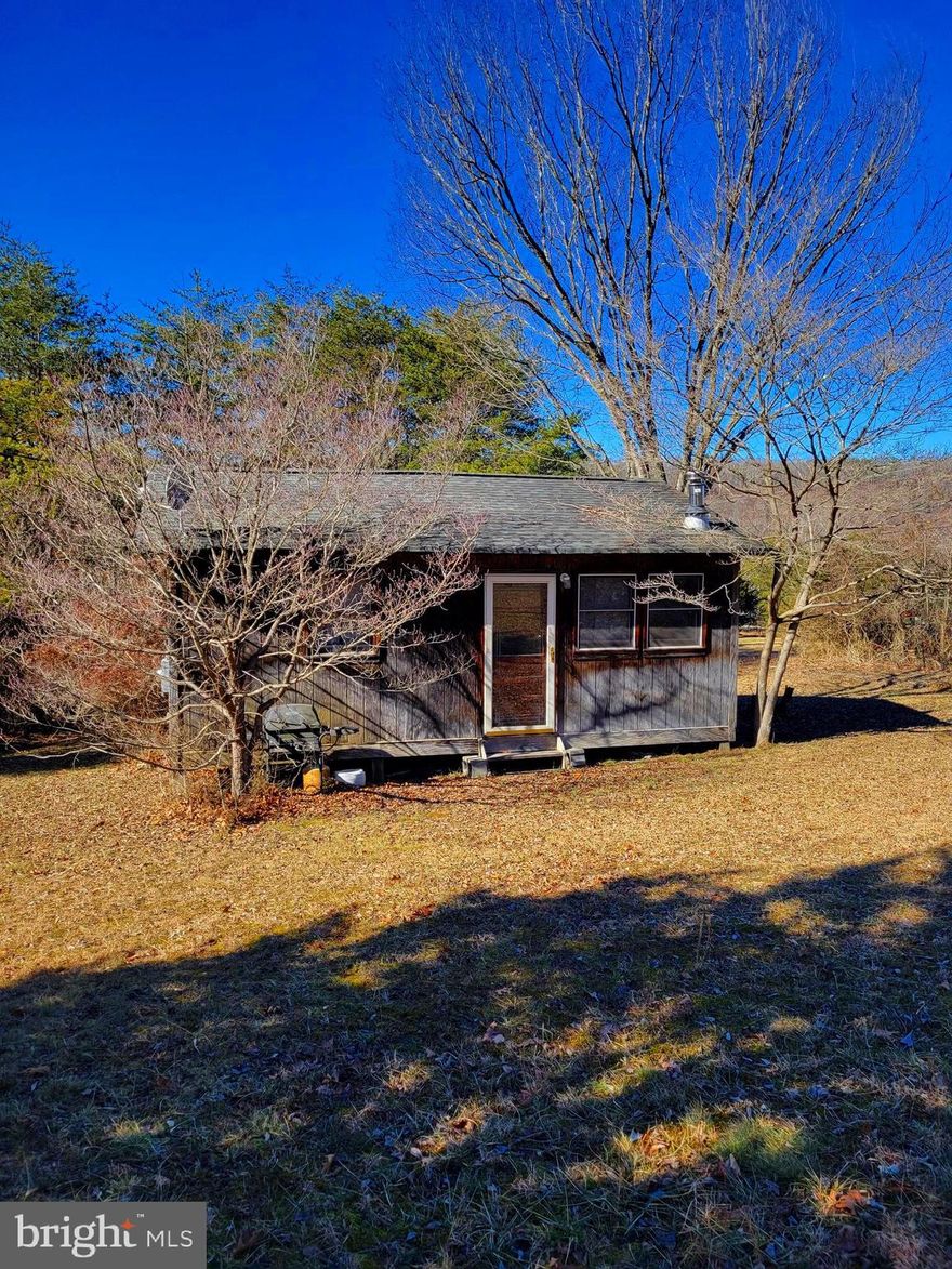 Dive into a world of outdoor activities with this river front property. Fish for the catch of the day, take a refreshing swim, embark on a kayaking adventure, or simply relax on the riverbank – the choice is yours.
With an unfinished cabin awaiting your personal touch, this 2 acre property is a canvas for your dreams. Tailor the space to meet your lifestyle and create a haven that reflects your unique taste. 
Cabin is not in the flood plain.