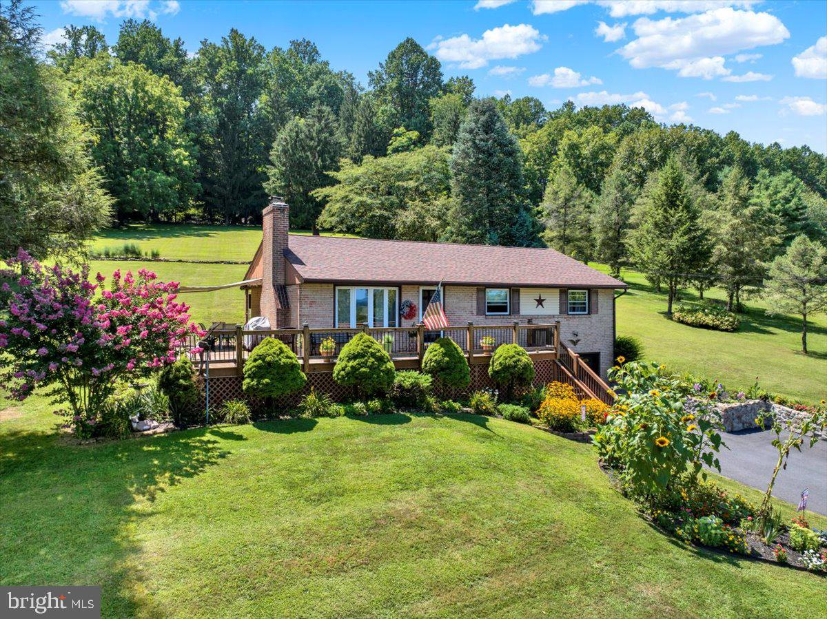 Looking for space, privacy, and a move-in ready home in Exeter? Welcome to 570 Walnut Rd! This charming raised ranch sits on over 2 acres of peaceful surroundings. Inside, you’ll find 3 spacious bedrooms, 1.5 bathrooms, a beautiful eat-in kitchen with granite countertops, and a bright living area with a brand-new wood fireplace for cozy nights. Step outside to a large deck, perfect for entertaining or simply enjoying the views. The lower unfinished level offers endless possibilities for whatever best suits your needs. Conveniently located near shops, schools, and major highways, this property combines a tranquil setting with everyday convenience. Schedule your showing today!