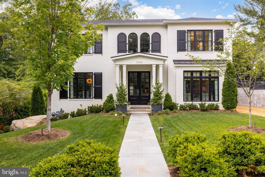 This stunning custom home is better than new.  Entry is through the welcoming foyer featuring a curved staircase.  The modern, flowing floor plan is perfect for elegant entertaining and everyday family living.  The gourmet kitchen has stainless steel appliances, custom cabinetry and marble countertops.  Adjacent is a butler’s pantry which includes a built-in wine fridge and separate walk-in pantry.   The breakfast area opens to both the family room with gas fireplace and covered back porch overlooking the backyard.  A convenient side entrance off the driveway has a large mud room, complete with cubbies and desk space.    At the top of the curved stair is a gracious landing featuring built-ins, sun-filled reading bench with storage beneath. The elegant primary suite includes dual large walk-in custom closets and spacious marble bath.  Three additional bedrooms, all ensuite, are also on this level.  The lower level has a fifth bedroom, recreation room with wet bar and playroom which could also be a home gym.  A cozy reading nook is tucked under the staircase.  A detached one-car garage features a perfect home away-from-home office or additional guest room/au-pair suite with full bath.  All this, sited on a beautifully landscaped lot offering the ultimate in privacy in the middle of the city.