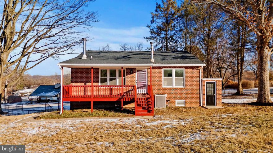 Welcome home to this beautifully maintained all-brick residence, ideally situated on a desirable corner lot in the wonderful Timonium Heights neighborhood and set on a spacious 0.64-acre lot. This 4-bedroom, 3-bath home offers the perfect blend of classic charm and modern updates. The main level features a sun-filled living room with a cozy wood-burning stove, ideal for relaxing or entertaining, and luxury vinyl plank flooring that continues throughout both the upper and lower levels.
The first floor includes the primary suite and an additional bedroom, offering flexible living options. The primary bedroom is a true retreat, complete with an exquisite, oversized bathroom, and all bathrooms throughout the home have been updated.
The fully renovated kitchen shines with brand-new stainless steel appliances, crisp white cabinetry, elegant quartz countertops, ceramic tile flooring, and a stylish tile backsplash. The lower level offers two additional bedrooms along with a versatile third room ideal for an in-home office, gym, or hobby space, plus a convenient covered, separate side entrance.
Major updates include a brand-new roof, HVAC system, water heater, and well pressure tank, providing peace of mind for years to come. Step outside to enjoy a beautiful deck with scenic town views, a fully fenced yard, and refreshed landscaping. This move-in-ready home is a must-see!