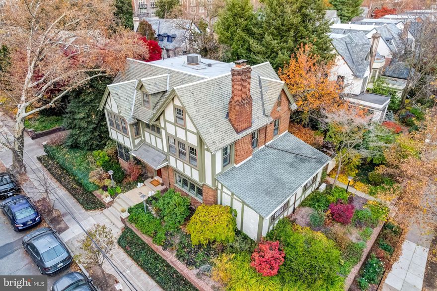 Exceedingly rare opportunity. There are only a few detached single-family homes on double lots in the desirable Penn Alexander CATCHMENT. None have come up for sale since 2018. This stunning character-laden and light-filled center hall Tudor, circa 1920's, was absolutely worth the wait! Includes original hardwood floors, doors and woodwork, leaded glass, crown and baseboard moldings, and more detail throughout.  Double lot--Serene and Spacious outdoor space.--so many areas to enjoy. Tons of windows for seemingly impossible light throughout. And did I mention this corner home is situated on Osage Avenue, among the most desirable tree-lined blocks in the entire city! (The house is raised above street level, which affords true privacy while allowing the sun and views to shine through).

5 bedroom plus huge family room, conservatory (another sunny family space), and a large office/sunroom (could even be another bedroom), 3.5 baths. (Home currently set up as a 4 bedroom and could also be set up as a 5 or 6 bedroom plus offices and family room). The conservatory is an unparalleled all-season indoor-outdoor off of the kitchen and the rear yard. Pristine condition and superb character throughout. Naturally refinished original hardwood floors throughout. Spectacular light from all four exposures. Wood burning fireplace. 2-zone central air and multi-zone hot water heat. Significant recent upgrades to systems, including fully rewired with no remaining knob and tube wiring. Ample storage. Spectacular outdoor space for the city. 3-car Parking (garage plus two driveway spaces). A very special opportunity in one of the City's most desirable neighborhoods and the Penn Alexander School Catchment.

One of the city's absolute best locations. The alley behind these homes is perfect as a place to play, hang-out, and ride bikes, and for neighbor, family, and friend gatherings. Within blocks of Clark Park and its superb Farmers' Market, Honeysuckle Provisions, ReAnimator Coffee, Knockbox Cafe, Local 44, Bottle Shop, Green Line Cafe, Dottie's Donuts, Mikcrate Cafe, TacoTaco Mexican, Tampopo, Pop Shop, Renata's, Clarkville, Baltimore Avenue Restaurant Row, CVS, Mariposa Food Co-op, University City Swim Club, the Penn Alexander School, and much more. Walk to HUP, Penn, CHOP, Penn Vet, Drexel, St Joseph’s Science Campus. 10 minutes to Center City by car and plenty of convenient SEPTA options. Note--47th Street is on the verge of being turned into a one-way street with one lane of traffic, a bike lane, and traffic slowing mechanisms (e.g., speed humps). This is a huge quality of life improvement upcoming for 47th Street.