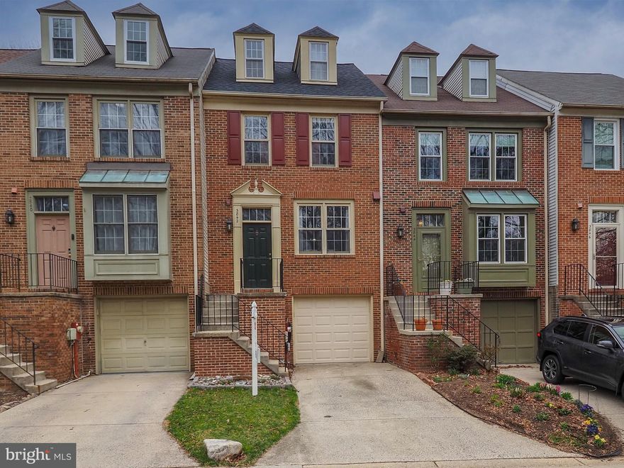 This gorgeous townhome in Greencastle Lakes has been lovingly updated over the past several years and it is a MUST SEE! The current owners have updated the kitchen (2023) to include upgraded, soft close cabinetry, Quartz countertops, beautiful tile backsplash, under cabinet lighting, stainless steel appliances, and tile plank flooring. Warm and welcoming laminate wood plank flooring flows throughout the home. The living room boasts a wood burning fireplace and sliding doors to the beautiful deck which was rebuilt in 2022 with TimberTech composite decking. The owners also added stairs to the beautifully landscaped fenced in rear yard and stone paver patio. An underlayment was thoughtfully added to the deck prior to building so that the patio below can be enjoyed even in inclement weather. Just out the rear gate you will find access to the community trails and just a three-minute stroll to the community pool and playground. The upper level offers two spacious bedrooms. The primary suite features stairs to the fourth level with a second wood burning fireplace. This area is currently being used as a home office but could also transition into a private sitting area. Both full baths on the bedroom level have been completely remodeled in 2023 including plumbing and electrical, fixtures, cabinetry with quartz countertops, drywall and tile flooring. The primary suite's bath offers a dual sink vanity and custom tiled shower that feels like a vacation retreat when you step inside. The hall bath is made more spacious by a pocket door that was thoughtfully added during the remodel.  The lower level features a family room that can also double as a third bedroom with a walk-in closet and access to the back patio and yard thru the sliding door. The 3rd full bath is also located on the lowest level of the home as well as the laundry. In the garage you will find the owner's private home gym and plenty of storage as well as an upgraded, insulated garage door (2021). The electric panel, which is also in the garage, was upgraded in 2024 to a 200amp service and is set up to accommodate an EV charger.  The roof was replaced in 2021, the HVAC and Nest thermostat were updated in 2019 and the Hot Water Heater in 2023. This gorgeous home faces the community's open space and trees. The community is just across the street from Fairland Recreational Park where you can take advantage of the playground, soccer field, baseball diamond, tennis courts and lots of trails for hiking and biking! The owners have thoughtfully and lovingly updated this house and it's the perfect space to call your next home, Welcome Home!