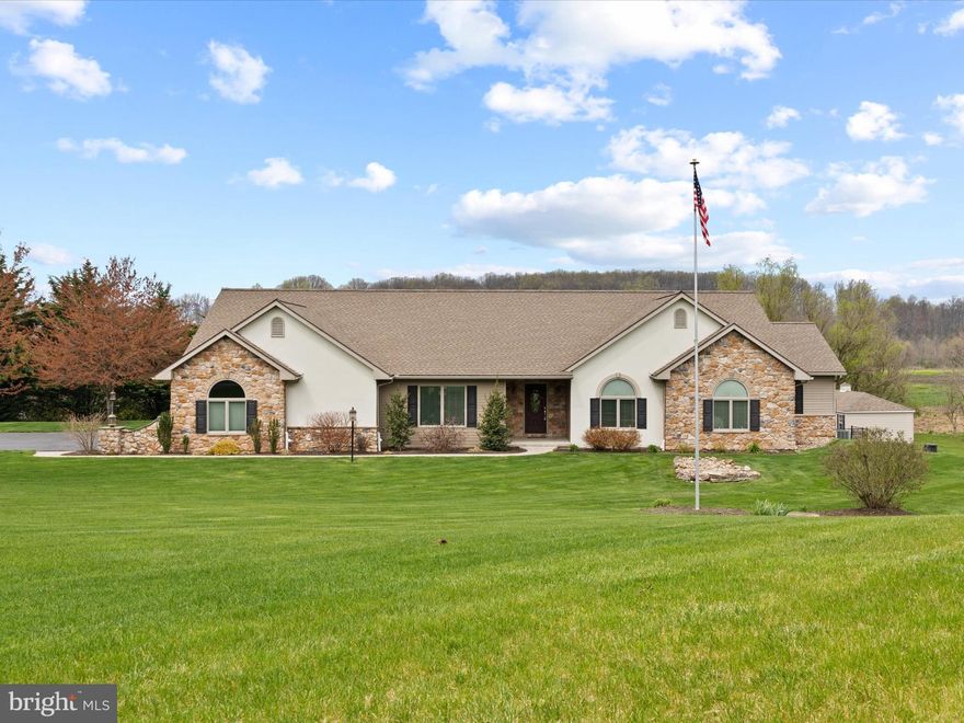 Welcome to this delightful residence situated in Lebanon, Pennsylvania. Boasting 4.19 acres of land, this property includes a main house with three bedrooms, one of which is currently utilized as an office, and family quarters with an additional bedroom. In total, the home offers four bedrooms, three full bathrooms, and two powder rooms, catering to all your indoor and outdoor needs. The main house features an upgraded primary bathroom, a main level laundry room, hardwood floors in the living room with a cozy fireplace and vaulted ceilings, a kitchen with granite countertops and an eat-in island, as well as family quarters. The family quarters has its own entrance and features a kitchen, dining area, sitting area, powder room, primary bedroom with walk-in closet, and primary bathroom. Outside, you'll find a covered patio area, a pool, ample green space for enjoying nature, and a separate insulated and heated workshop. Don't let this opportunity slip away - schedule your showing today to make this lovely property yours!