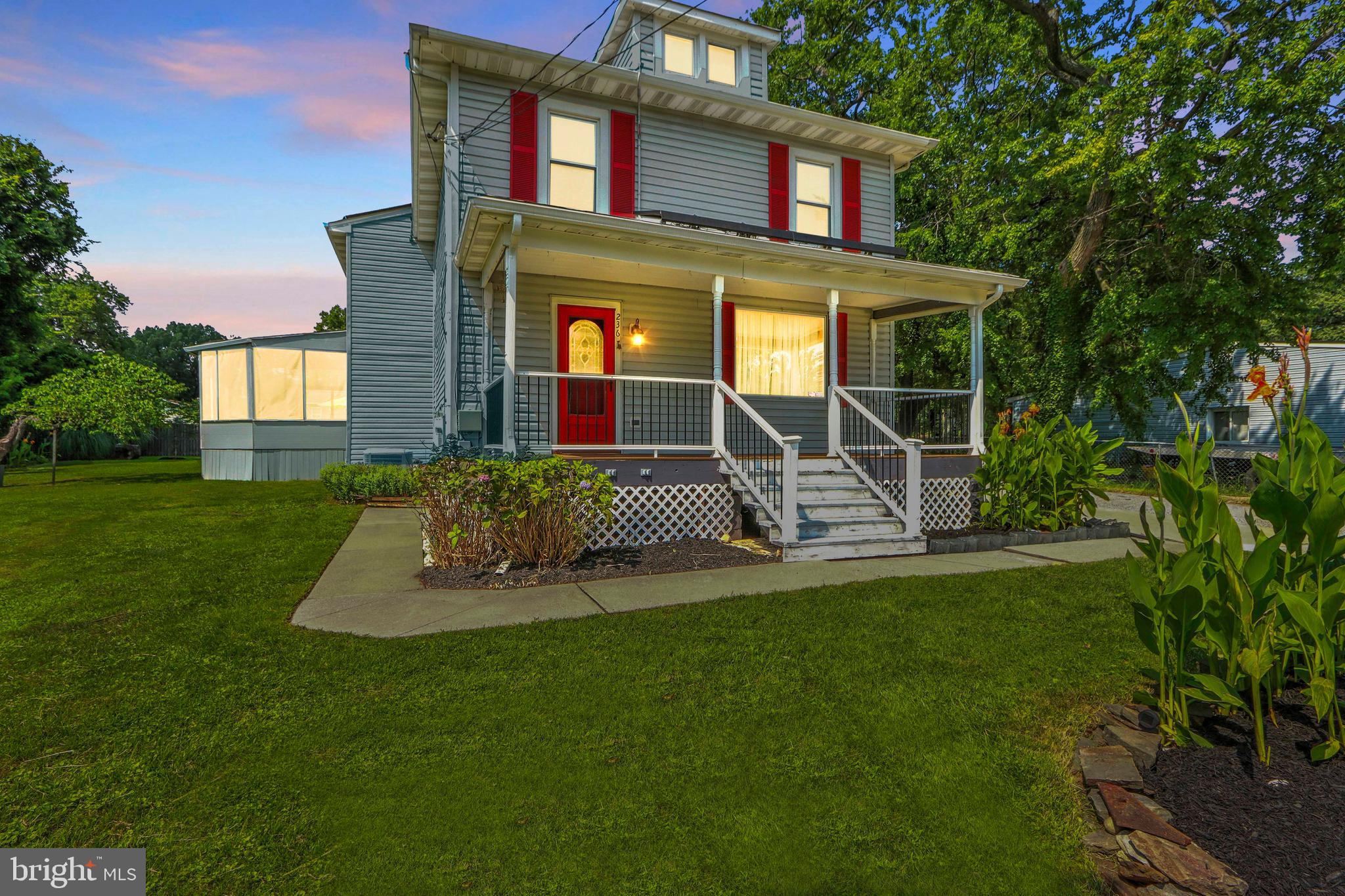 Welcome to 236 Poplar Avenue – where space, charm, and privacy come together in perfect harmony. Situated on a generous .68-acre lot, this 4-bedroom, 2.5-bathroom home offers the rare opportunity to enjoy expansive living both inside and out — right in the heart of Glen Burnie. Step inside to find a warm and inviting layout, perfect for everyday living and effortless entertaining. The main level features a bright and spacious living area, a well-appointed kitchen with ample storage, a dedicated dining space and a family room with a gas fireplace that opens to a large circular screened in porch. Upstairs, you'll find four comfortable bedrooms, including a spacious primary with a walk-in closet. Outside, enjoy the kind of yard you rarely find in this area — nearly 3/4 of an acre of flat, usable land, perfect for outdoor gatherings, a garden, or even future expansion. Whether you're hosting a summer barbecue or simply enjoying the peace and quiet, this backyard delivers. Conveniently located just minutes from BWI Airport, Arundel Mills Mall, Fort Meade, major commuter routes, shopping, and dining, this home offers both accessibility and tranquility in one unbeatable package. Don't miss your chance to own this one-of-a-kind property with room to grow. Schedule your tour today!