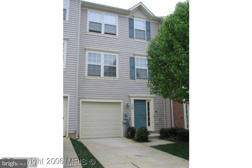 Spacious garage townhouse in desirable Spenceola Farms.  Property is great for entertaining with lower finished basement with exit to backyard.  Upstairs features familyroom opening onto deck overlooking open area.  Bright kitchen with 42in. cabinets all appliances and recessed lighting.  Three nice-sized bedrooms, including master with master bath, and main bath.  Come make this your home!