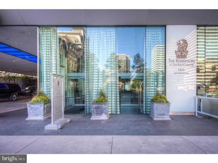 NEW LISTING! Enjoy the Lifestyle and Amenities that can only be experienced at The Ritz-Carlton Residences! This gorgeous 2,115 sq ft custom condo is set on the 37th floor of The Residences at The Ritz-Carlton and offers panoramic views across the city. No expense was spared in this state-of-the-art, completely upgraded and totally automated condo, including Elan automation system, speaker and AV systems, 29 zone Lutron lighting system, electronic shear and shade system, 4-zone HVAC and much more. The fabulous gourmet kitchen includes Sub-Zero, Viking and Miele appliances, custom cabinets and large center island overlooking the dining area and living room. The beautiful primary suite features dual bathrooms, with Calcutta marble and  custom walk-in closets with impressive closet systems throughout. Second bedroom with en-suite bath has beautiful views of City Hall and the City!  A powder room and custom laundry room complete this fabulous floor plan. ONE PARKING LICENSE INCLUDED. Enjoy all Services and Amenities of The Ritz-Carlton including: Concierge, 24 hour Doorman, Chauffeur-Driven Towncar, Fitness Center with PreCor Equipment, Indoor Lap Pool, Hot Tub, Yoga/palates Room, newly renovated Residents Lounge & Media Room, Residents' Gated Garden, Dog Park, Newly Renovated Outdoor Terrace with grills, fire-tables, and multiple private seating!