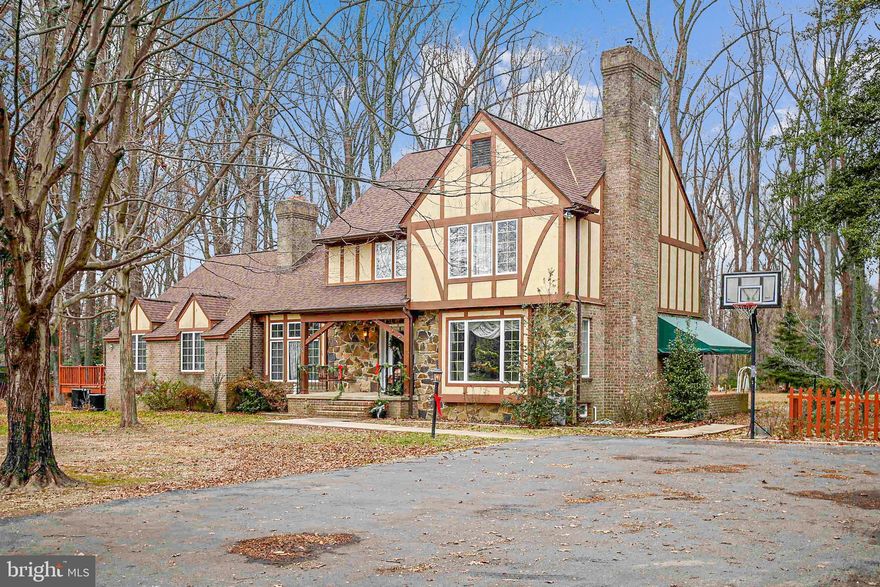 Prime Location !  Located within 5-Miles of the United States Naval Academy, this property is beautifully situated on 4-ACRES offering a SPACIOUS 6BR / 5BA HOME  PLUS AN ADDITIONAL 3BR / 3BA BACK HOUSE (Call List Agent for Info on back house).   Built in 1990, this custom and well built home features 4 levels of living space, boasting over 5,500 SQ FT , hardwood floors that were just recently refinished 2021, two fireplaces, large library with beautiful built-ins, sunroom, and guest quarters.  Enter the property by means of a long maple tree lined driveway, two out buildings, pastures, a large wraparound deck, and fire-pit are just a few of the property details. Main & Back House Roof's Replaced Less than 5 YRS AGO. New Interior PAINT & CARPET. Hardwood Floors just Refinished 2021.