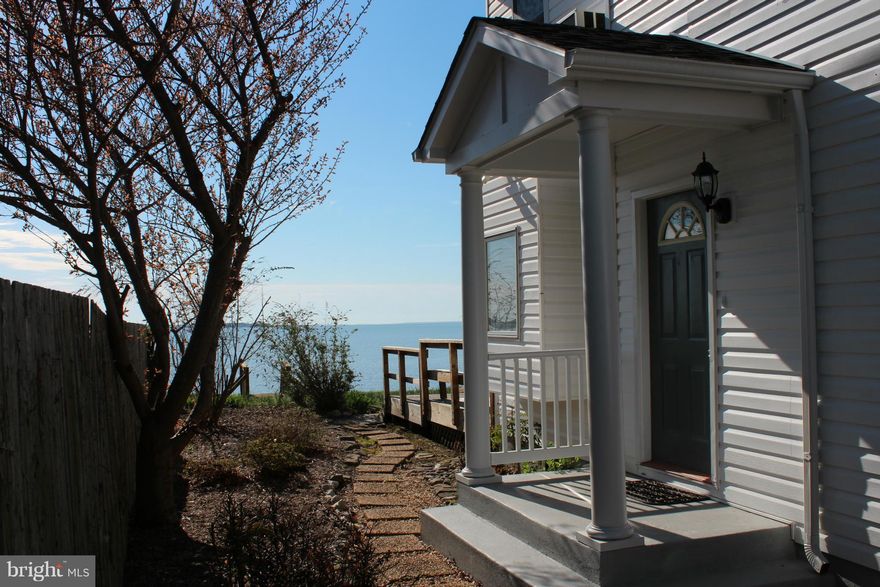 Cobb Island Waterfront w/ Beautiful views of Wicomico & Potomac Rivers! Private Sandy Beach Approved Pier Permit in Hand! You will feel on vacation in this home. Unique Floor Plan has 2 private entrances & In-Law Suite or for Guests, or growing family. Beautiful Hardwood throughout, 2 Family Rooms! Custom Built-Ins, Wet Bar, Granite & Ceramic Upper Deck and Enclosed Sun Room & Lower Deck!