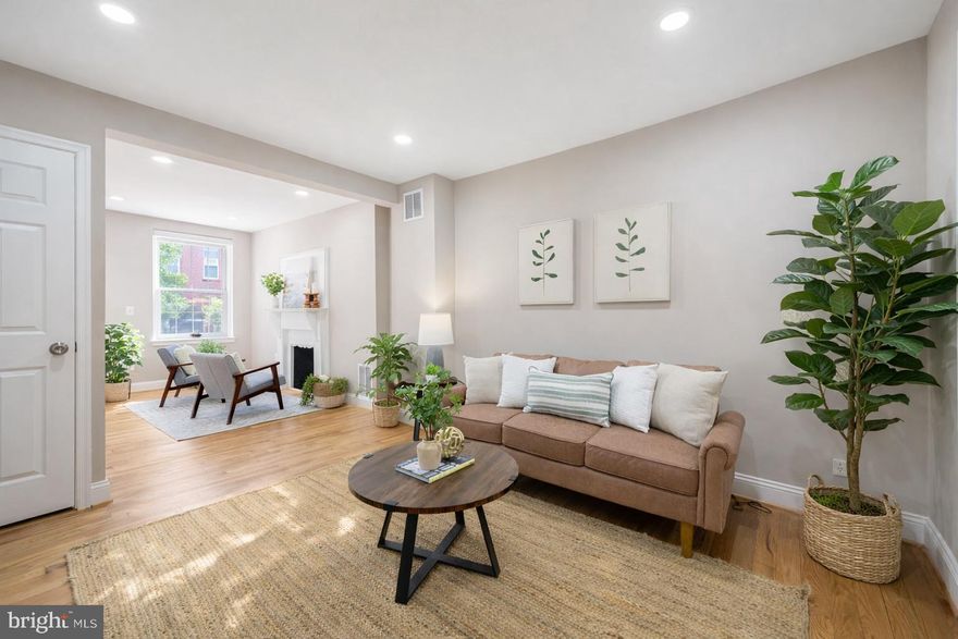 Nestled in the heart of Federal Hill, this charming three-bedroom home blends classic Baltimore character with thoughtful modern updates. Just two blocks from Federal Hill Park and five blocks from Riverside Park, the location offers the perfect balance of city convenience and green space.

Step inside to a warm and inviting living room featuring a cozy fireplace, exposed brick accents, and an abundance of natural light that pours throughout the home. Rich hardwood flooring runs seamlessly across every level, enhancing both the warmth and continuity of the space.

Beyond the living area, you’ll find a dedicated dining room and a convenient half bath on the main level—ideal for everyday living and entertaining. The rear of the home opens to a fully renovated kitchen with brand-new appliances, stylish finishes, and direct access to a private outdoor retreat. The brick-paver patio, framed by greenery, creates a serene setting perfect for morning coffee or unwinding with an evening glass of wine.

Upstairs, the second level offers a spacious bedroom, two versatile bonus rooms—ideal for a home office, nursery, or guest space—and a full bathroom. The top level features two additional bedrooms, providing flexibility for a variety of living arrangements.

Enjoy unbeatable proximity to everything Federal Hill has to offer, including a vibrant mix of restaurants, shopping, nightlife, and multiple grocery store options all within walking distance or a short drive. Commuting is effortless with quick access to I-95, and you can be in the Inner Harbor in just five minutes.

A rare opportunity to own a character-filled home in one of Baltimore’s most sought-after neighborhoods.