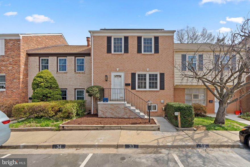 Prepare to be wowed by this beautifully updated, all-brick home! Freshly painted throughout, this 3-bedroom, 2.5-bathroom residence is move-in ready and brimming with modern charm. A custom entryway organization system greets you upon arrival, offering a stylish and practical storage solution. The updated kitchen boasts white cabinets, gleaming stainless steel appliances, and elegant granite countertops, seamlessly flowing into a nice-sized dining area with hardwood floors. Sunlight floods the adjacent family room, creating a warm and inviting atmosphere. Step outside to a fully fenced backyard that opens to a lush green common area with a nearby tot lot. The fully finished lower level provides the perfect flex space for a home office, workout room, or recreation area, complete with access to ample storage. Upstairs, you'll discover three generously sized bedrooms with custom closet organizing systems, and 2 full updated bathrooms showcasing a sleek, modern aesthetic. Benefit from energy savings with solar panels and the convenience of an HOA-approved EV charger. Located in a vibrant area with restaurants, shopping, public transportation, and parks just around the corner, this home offers unparalleled convenience and lifestyle. Don't miss your chance to experience the perfect blend of comfort, style, and location!