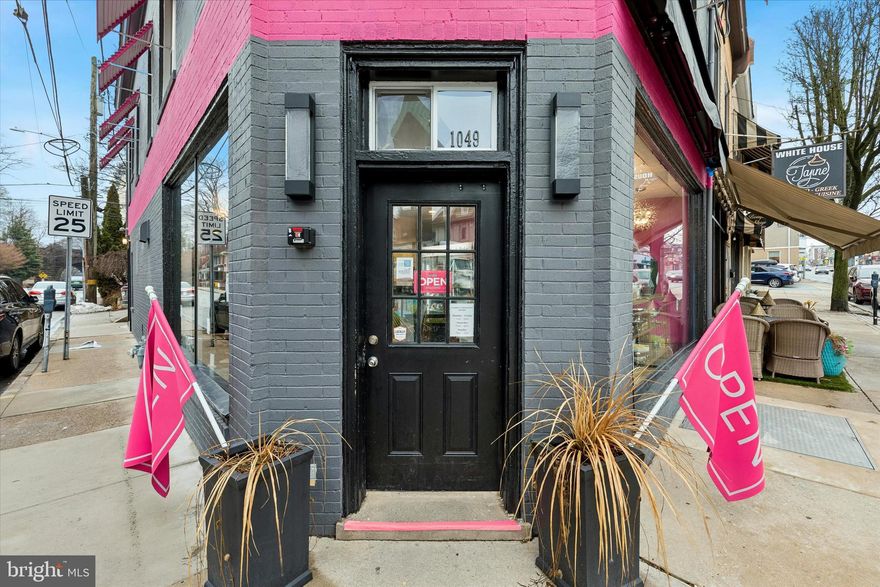 Positioned prominently on a coveted corner in the heart of Bryn Mawr, this mixed-use property presents a compelling investment or owner-user opportunity within Lower Merion Township’s 4100 Mixed-Use zoning, allowing for a dynamic blend of retail, office, and residential uses.

The ground level storefront enjoys exceptional visibility with expansive corner windows—ideal for retail, boutique office, or professional services seeking strong pedestrian presence. A full unfinished basement provides valuable additional storage and operational space.

Above, with its own private entrance, is a beautifully renovated two-bedroom, one-and-a-half-bath apartment, thoughtfully updated during 2025 renovations. The residence offers a modern, turnkey living space that can generate rental income or serve as a convenient live-work option.

Located in one of the Main Line’s most walkable village settings, the property sits just steps from Bryn Mawr’s vibrant collection of restaurants, shops, cafés, and cultural landmarks, including Ludington Library and the Bryn Mawr Film Institute. Multiple SEPTA train stations are nearby, and the area is surrounded by renowned institutions including Villanova University, Bryn Mawr College, Rosemont College, and Harcum College.

A rare chance to own a corner mixed-use building in a premier Main Line location, offering flexibility, visibility, and long-term upside.