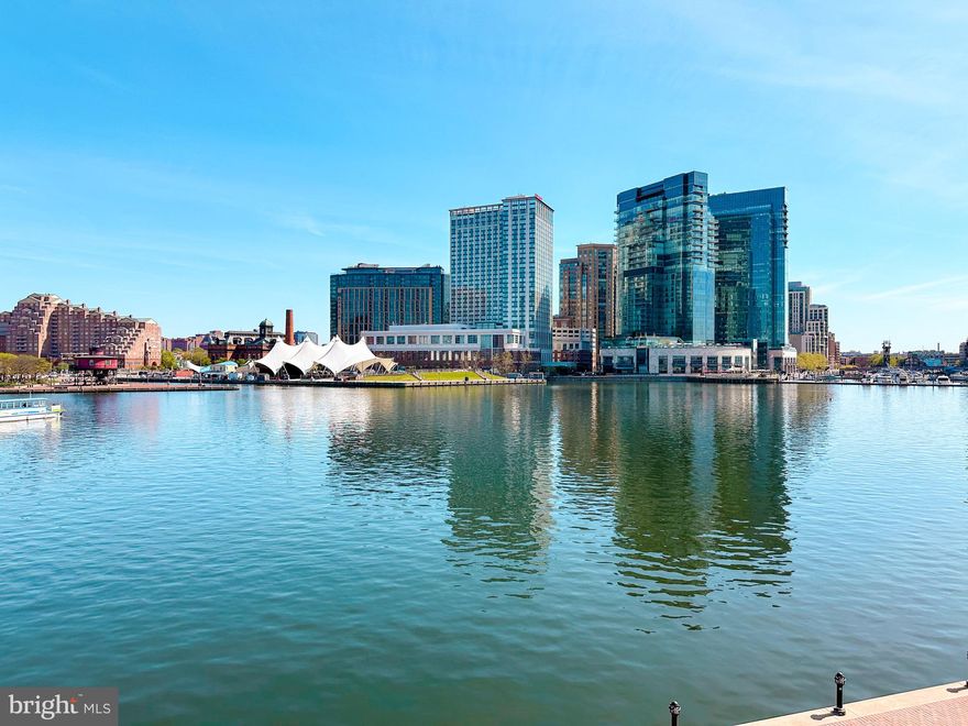 Experience luxury waterfront living in this stunning three-bedroom, two-and-a-half-bathroom condo with captivating views of the Inner Harbor. The open floor plan welcomes you with gleaming hardwood floors and a meticulously renovated kitchen and living room, perfect for entertaining. Retreat to the primary bedroom with its generous walk-in closet and ensuite bathroom, offering both comfort and convenience. This waterfront oasis is not just about the condo itself, but also the exceptional building amenities it offers. Enjoy the peace of mind provided by 24/7 front desk staff and dedicated parking, stay active in the fitness center and indoor pool, or unwind in the theater room, board room, residents' lounge, and game room.
