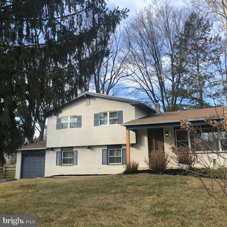 **Completely Renovated from Top to Bottom!**
Welcome to this beautifully updated split-level home, ideally situated on a quiet, tree-lined street that dead-ends to a scenic walking trail in desirable Malvern. Thoughtfully renovated throughout, this home offers modern style, comfort, and peace of mind.

The main level features a sun-filled living room with a large bay window and an adjoining dining room with brand-new sliding patio doors that open to a cozy deck and spacious covered screened-in porch—perfect for enjoying outdoor living through three seasons. The stunning gourmet kitchen showcases shaker-style maple cabinetry, marbleized quartz countertops, stainless steel appliances, window and skylight and sleek black sink and accents. High-end refrigerator even has 2 types of ice cubes and a built-in, inside Filtered Water Pitcher at the ready!

The lower level offers a generous-sized family room with direct access to the attached garage, plus a versatile bonus room ideal as a fourth bedroom, home office, or hobby space. An updated powder room and laundry/utility room complete this level.

Upstairs, you’ll find three well-sized bedrooms, a full hall bath, and a primary bedroom with a private ensuite bath and gorgeous walk-in shower.

Enjoy worry-free living thanks to extensive upgrade, including new electrical panel and wiring, new plumbing, new roofs on the main house, garage, Garden shed and a wonderful outside sunroom - screened-in and new outdoor ceiling fan to enjoy the outdoors, new exterior front with Dryvit, new sliding patio door, new windows throughout, new flooring and refinished hardwoods, fully renovated kitchen and baths, fresh interior and exterior paint, all new attractive lighting fixtures, and a spacious shed for outdoor storage. All work has been inspected and approved with township permits.

Conveniently located near the Great Valley Corporate Center, Great Valley Penn State campus, downtown Malvern shopping and dining, and local schools—plus real estate taxes under $5,000! This move-in-ready home truly has it all. You’re going to love it!