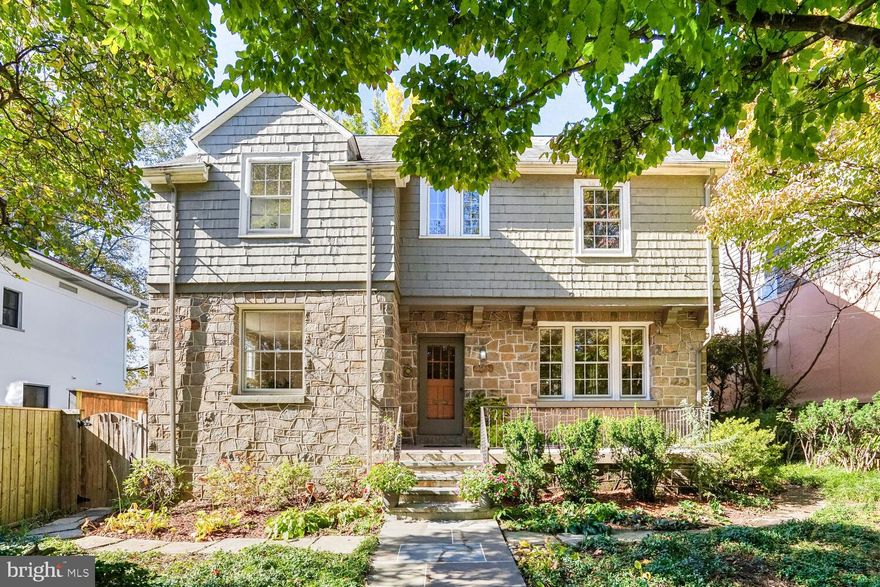 Step into a world of refined sophistication with this exceptional property, gracefully nestled in prestigious Observatory Circle. Spanning over 5,200 square feet, this residence is a masterclass in traditional luxury and timeless charm.

From the moment you enter through the radiant spacious center staircase foyer, you are enveloped in an aura of classic elegance. The intricately crafted moldings and refined architectural details create a setting of grandeur and warmth highlighted by hardwood floors throughout. This illustrious property boasts six generously proportioned bedrooms, each with windows on two-sides with bucolic views of Washington’s idyllic mature trees, and five and a half bathrooms, ensuring comfort for every resident and guest. The large open-concept kitchen and family room addition, designed by renowned architect Don Hawkins, expands the rear of the home - ideal for both intimate gatherings and grand celebrations. The gourmet kitchen features a large center island with bar seating, two sinks, Thermador range, and views of the lush back gardens.The kitchen seamlessly flows into the bright and expansive family room showcasing floor-to-ceiling custom millwork built-in shelving. French doors invite you to unwind in the stately living room, which is accentuated by an exemplary gas fireplace and mantle. Brimming with natural light, the main level also includes a formal dining room equipped with built-in corner cabinets perfect for hosting sumptuous meals. A thoughtfully designed laundry room, a discrete half bathroom, and supplementary counter and cabinet storage lining the hallway complete this level.

The lower level offers a favorable apartment suite with a private entrance, galley kitchen with table seating, a full bathroom, and generous living space, providing a private retreat for guests or family members. An expansive storage room, as part of the addition, completes this level - offering space for decorations and larger items, or possible recreation room.

The primary suite is a haven of tranquility, featuring vaulted ceilings, a well-appointed walk-in closet and dressing room, and a private terrace where you can indulge in serene views and moments of quiet reflection. The en-suite bathroom is a sanctuary boasting a spa-like jacuzzi tub and private linen closet.

The exterior of the property is equally magnificent boasting colorful landscaping and a fully fenced-in level yard, offering an oasis of peace from every corner. The no maintenance Pro-Cell deck features thoughtful perimeter bench seating, inviting al fresco dining and leisure, while the detached garage provides ample space for storage.

This light-filled residence, with its impeccable design and eloquent details, represents the pinnacle of ideal living in Observatory Circle, offering an unparalleled blend of elegance, comfort, and prestige in one of the city's most coveted locales.