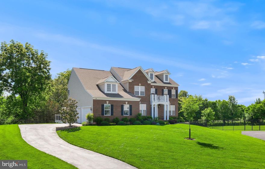 Experience the perfect harmony of nature, space, and design at 7 Heartwood Terrace. Ideally situated on a quiet cul-de-sac in The Preserve at Rock Creek—one of Rockville’s best-kept secrets. This newer community borders the protected Rock Creek Park conservation area, ensuring no future development and granting direct access to scenic walking and biking trails.
Built in 2015 by Stanley Martin Homes, this expansive brick front colonial provides 6,676 total square feet across three finished levels with 5 bedrooms, a home office, 4 full bathrooms, and a powder room.
Showcasing an array of upgrades and high-end amenities, including:
BRAND NEW WALK-OUT FINISHED BASEMENT (JULY 2025), REAR SUNROOM EXTENSION, 3” SOLID MAPLE HARDWOODS (main and upper levels), EXTENSIVE MOLDING, RECESSED LIGHTING, OWNER’S SUITE SURROUND SOUND, CEILING STEREO SPEAKERS (dining room, living room, sunroom, and deck), WHOLE-HOUSE GAS GENERATOR, HIGH EFFICIENCY LEED-APPROVED HVAC, ELECTRONIC AIR PURIFIER, ELECTRIC AIR CLEANER, HUMIDIFIER, WHOLE HOME ALARM SYSTEM, EXTERIOR CAMERAS, ATTACHED 3-CAR GARAGE, and more!
Set on a private .54-acre lot, one of the many highlights of this home is the backyard retreat —complete with a wrap-around walk-down deck, a  large paver patio with remote-controlled natural gas firepit, and manicured landscaping—ideal for both entertaining and unwinding.
The home’s bright and airy atmosphere is matched by luxury finishes and thoughtful design. At the heart of the home is the gourmet kitchen, which flows effortlessly into the sunroom, breakfast area, and family room. This chef’s space includes a large center island with breakfast bar, 5-burner gas cooktop, dual wall ovens with convection, granite countertops, stainless steel Electrolux appliances, contemporary backsplash, wine rack, maple cabinetry, and a walk-in pantry.
The sunroom is bathed in natural light from three walls of windows, including French door access to the rear deck. The family room, anchored by a cozy gas fireplace, connects seamlessly to both the kitchen and sunroom.
A formal living room, dining room, private office, powder room, and interior access to the 3-car attached garage complete the main level.
Upstairs, you’ll find four generously sized bedrooms and three full baths. The spacious owner’s suite features a tray ceiling, a large sitting/media room, and includes a huge walk-in closet. The upscale bathroom is finished in contemporary tile and granite. It showcases a soaking tub, glass-enclosed shower, dual vanities, and a private water closet.
The brand new walk-out lower level—completed in July 2025—offers expansive recreation space, ideal for a lounge, playroom, game room, or guest suite. It includes a fifth bedroom, full bathroom, and a large storage room with a window, offering potential to be finished as a sixth bedroom, second office, home gym, or media room.
Enjoy a prime location with easy access to shopping, dining, entertainment, and major commuter routes. Nearby parks, golf courses, and recreational amenities further enhance the lifestyle—all within the top-rated Montgomery County school system.