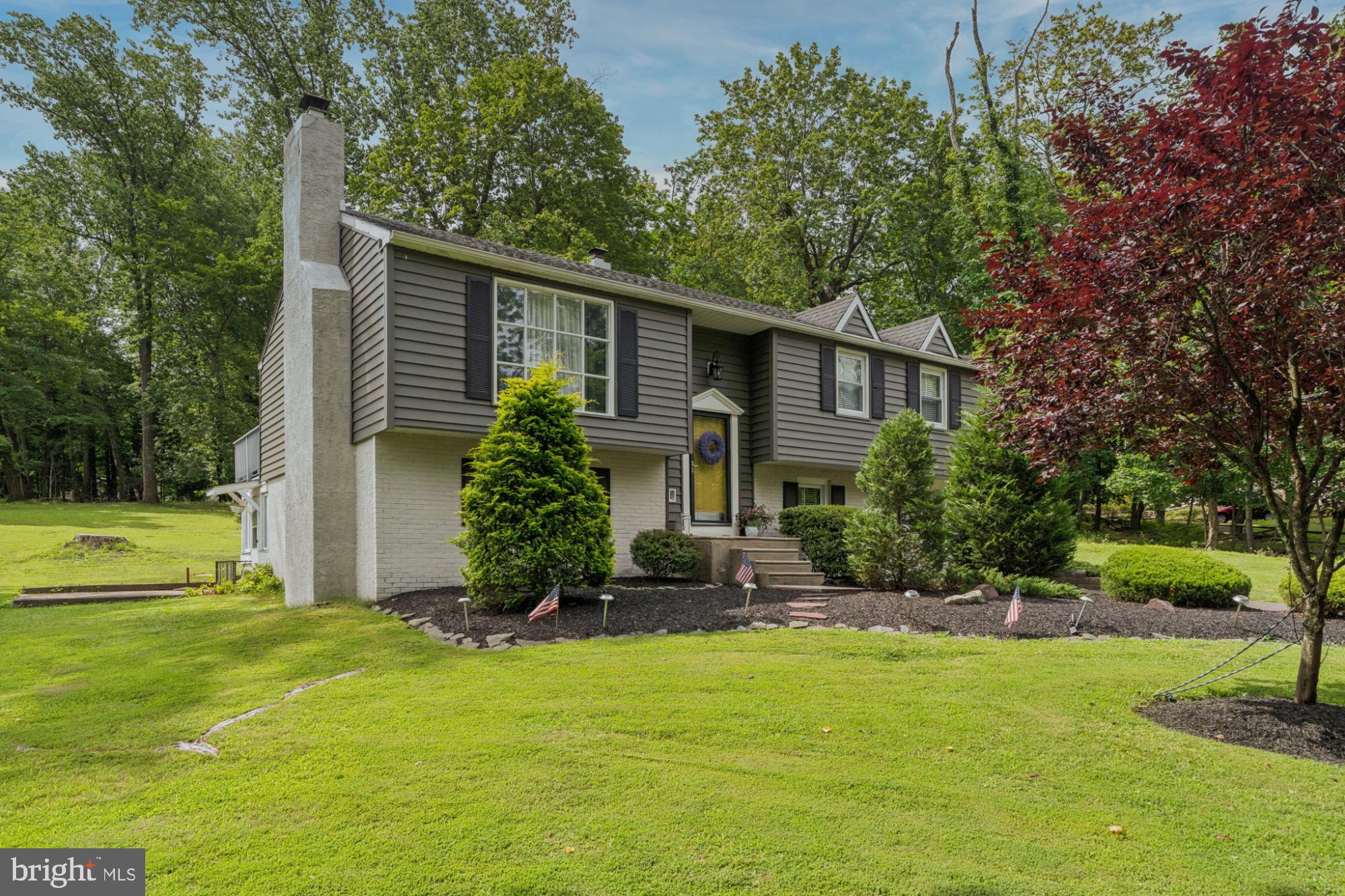 Welcome to 1027 Churchville Road, a beautifully updated single-family home located in the heart of Southampton, Bucks County. This spacious 4-bedroom, 2.5-bath home offers a thoughtfully designed layout, perfect for comfortable family living and entertaining. Step inside to find a bright and welcoming main level featuring a spacious living room with abundant natural light and updated flooring throughout. The renovated kitchen boasts modern cabinetry, sleek countertops, and stainless steel appliances, flowing seamlessly into the dining area—ideal for hosting gatherings or enjoying everyday meals. Upstairs, you'll find three generously sized bedrooms and an updated full bathroom, offering comfort and privacy for family members or guests. The lower level is a standout feature of the home, offering a large additional living area perfect for a family room, playroom, or media space. This level also includes a fourth bedroom—ideal for guests, a home office, or extended family—as well as a convenient second bathroom, laundry area & garage. Step outside onto the expansive rear deck that overlooks a large, private backyard—perfect for entertaining, gardening, or relaxing in your own outdoor retreat. There is also a large sunroom off the back of the home. The sizable lot offers endless opportunities for outdoor activities and customization. Additional features include a private driveway, updated mechanicals, and a location that offers easy access to award-winning Centennial schools, shopping, dining, parks, and major commuter routes. Turn the key and move right in—1027 Churchville Road is ready to welcome you home!