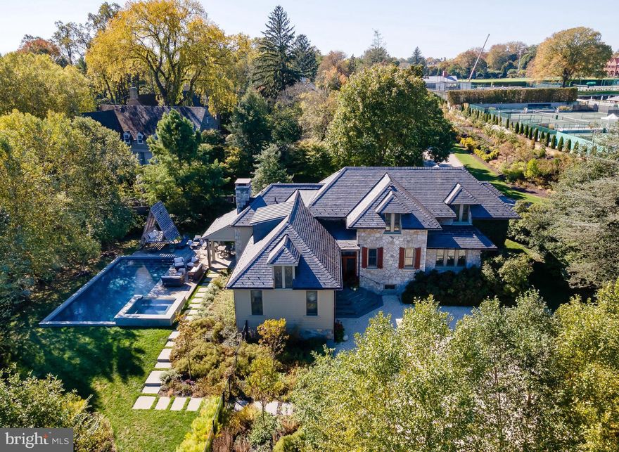 The original gatehouse to AJ Cassat’s “Cheswold” estate, 201 Cheswold Lane presents a rare opportunity for today’s modern convenient living. Originally built circa 1872, with an 1880 addition by Frank Furness, it is now completely renovated, expanded and modernized, with attention given to conserving historic attributes, with renowned architect John Milner overseeing the 2012 home transformation. Additional outdoor living space was added in 2015 to include a pool, spa, patio and covered pavilion with seating and fireplace. Significant thought was put into the landscape architecture to ensure privacy, beauty and a tranquil oasis.

The property boasts exceptionally appointed minimalist materials on the first floor which include the front foyer and mud room, family room with stone surround gas fireplace, kitchen with center island, window bench seating and notably a wall of cabinetry in lieu of upper cabinets. The spacious, house wide, living room provides generous opportunity for family gatherings and entertainment, connected via the floor to ceiling bookshelves along the sunny front hall.  

The first-floor primary suite encompasses a private large bedroom, walk-in wood paneled closet and large bath with shower.  Two additional bedrooms on the second floor provide privacy and share an appointed hall bath. Not to be missed, an ensuite bedroom and bathroom at the end of the hall allow for additional privacy. Two bonus spaces on the second floor can be used as an office and seating area. There are multiple uses in this expansive upstairs space. 

Sought after location on a private lane, next to an historic club. Pleasantly walkable to Haverford Square, the R5 Main Line train to center city Philadelphia and all the amenities, shopping, clubs, schools, hospitals, colleges and universities that speak to the convenience and allure of the Main Line.