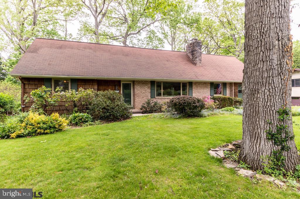 Charming 4 bedroom, 2.5 bath cape cod style home on nice wooded lot in desirable Kaywood. The first floor of this spacious home includes slate floor foyer, formal living room with brick fireplace, formal dining room, eat-in kitchen, family room/study, and 2 bedrooms with a full bath. Second floor has 2 generous sized bedrooms, a full bath and additional walk-in unfinished storage space. Other features include: 30x16 screened porch off the family room overlooking private backyard. Hardwood floors throughout, newer Pella windows, individual heat pumps for first and second floor as well as oil fired hot water baseboard heat. Partially finished walk out lower level with half bath and unfinished storage space. Oversized 1 car garage.