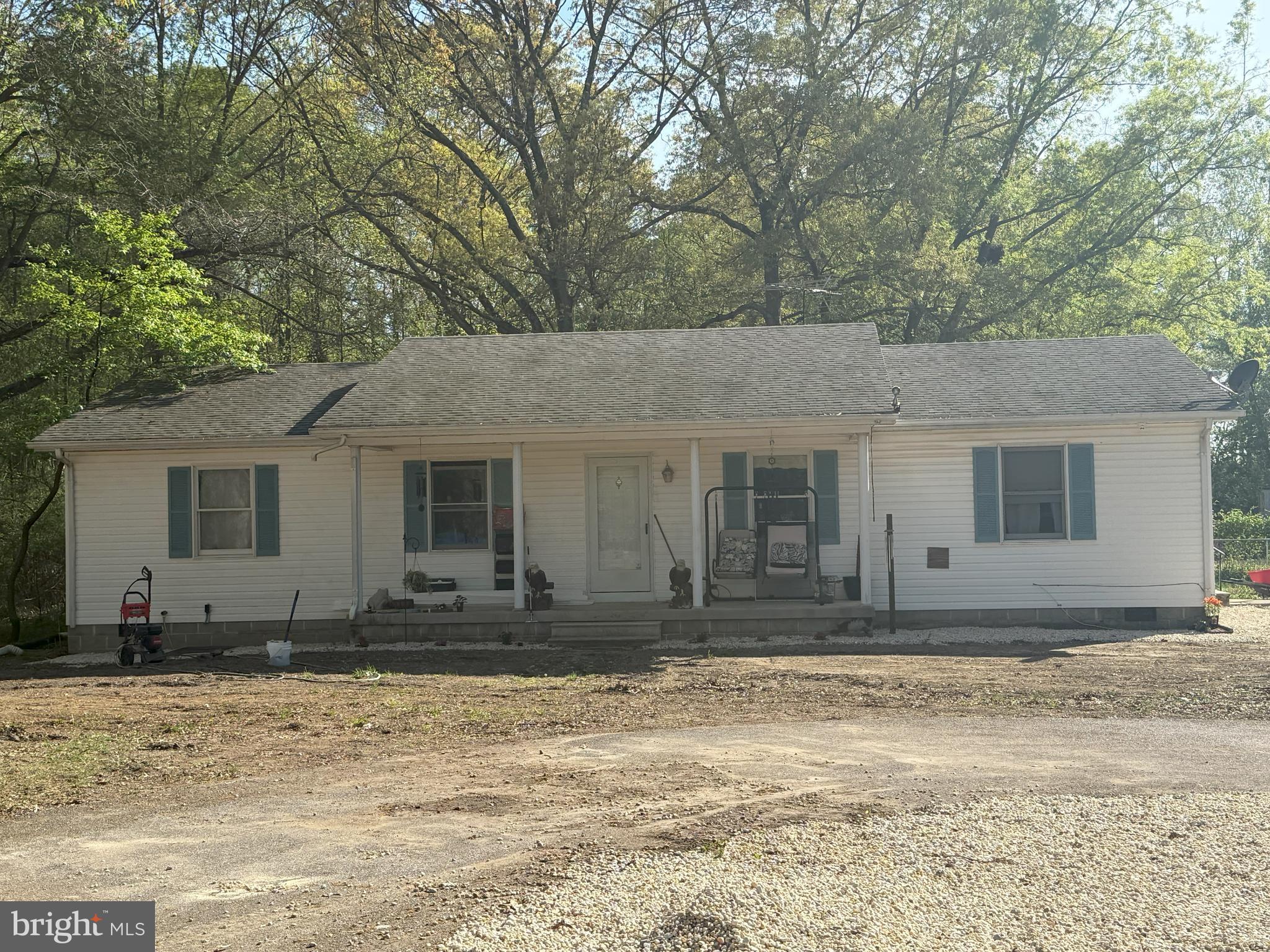 Welcome to the Country! Rancher featuring 4 bedrooms and 2 full bathrooms, living area with brick wood fireplace. Consists of two parcels (202 & 203) totaling approx. 9.04 acres. Oversized garage with loft area. Separate 2 car garage with shop area. Needs some TLC but can be brought back to life and enjoy the peaceful Eastern Shore Living.
