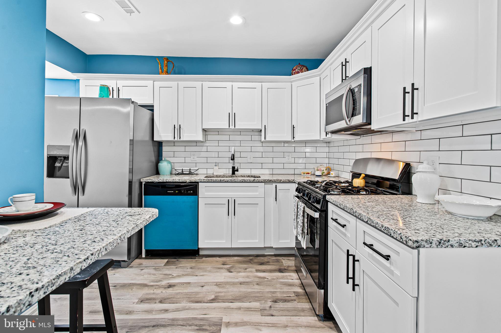 Welcome to this stunning fully renovated detached home in Baltimore City, just steps from Pimlico Race Course!
With three finished levels, this spacious residence features 5 bedrooms and 2.5 bathrooms, offering an abundance of natural light throughout.
On the main level, you'll find a convenient powder room, a primary bedroom with a full ensuite bath, and a beautifully updated kitchen complete with granite countertops, stainless steel appliances, and an eat-in dining area perfect for everyday living.
Upstairs, there are three generously sized bedrooms and a full bathroom. The third level offers a cozy fifth bedroom—ideal for a home office, guest space, or creative retreat.
The unfinished basement provides excellent storage space and flexibility for future customization, washer and dryer included.
Outside, enjoy relaxing on the welcoming front porch, hosting gatherings on the new deck, and the ease of off-street parking with a private driveway and carport.
With quality upgrades throughout, this home offers comfort, convenience, and peace of mind for years to come.
Don’t miss your opportunity to call this beautiful home yours—schedule your showing today!
Seller is Very motivated.