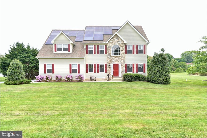 Pride of ownership shows! Convenient to Route 1 and I-95. Main entrance with a 2 story foyer, large kitchen with island and ceramic tile.  Sliding doors that lead to a large deck with a wood Yardistry gazebo. The cozy family room features a floor to ceiling stone wall with a pellet stove, master bedroom and bathroom on the main floor! Second floor features an enormous second master bedroom and bathroom! Fresh paint throughout most of the house.  Large unfinished basement with a walkout exit that leads to a patio and another wood Yardistry gazebo.  Great 2.25 acre lot!