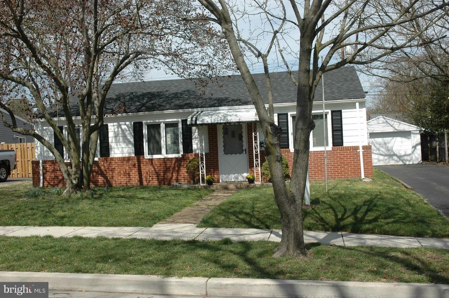 Adorable 3 bedroom, 1 bath starter home, or money producing income generator! Super conveniently situated across from the Harundale Plaza, this home has been freshly painted and carpeted throughout. Recently replaced roof, cetral a/c, one car garage, covered back porch area, and ample yard; this place is ready to go! Walk to Mission BBQ, Outback, & HomeGoods!