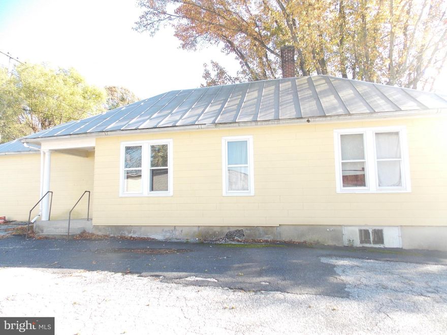 Priced way below appraised value.........Price includes 3 parcels.....tax id 03023222- 2 acres of land which sits behind the buildings.  tax id    which is a  small house  and a 10000 sq ft. wooden building on an acre.   The 10,000 sq ft building is currently being rented for 1000/month until November of 2020. The lease conveys with the sale.  The third parcel is  a 6000 sq ft block building with offices and 2 baths.  This parcel was a successful trucking terminal/business at one point.  Property was recently  appraised  and  seller is negotiable because property is being sold as - is.  But this zoning is limited in the county now which that in itself  is value.