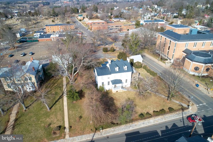 Calling all visionaries to this once in a lifetime ownership opportunity in the heart of Old Town Warrenton. Consisting of three lots totaling .74 acres, this property is zoned CBD (Commercial Business District) and PSP with public sewer, water and gas. Currently the lots include a 4,156 sf historic house last renovated in 1976 and presently being used as an office on the corner of Culpeper Street and a 400 sf retail structure on Lee Street. With the relocation of the historic house, the lots would be an ideal location for a multistory development site with retail on the bottom and apartments above where sunsets highlight the mountain views. Within easy walking distance, residents and customers alike would be able to enjoy all that Old Town has to offer with the additional perk of an adjoining public parking lot that has 130 spaces.