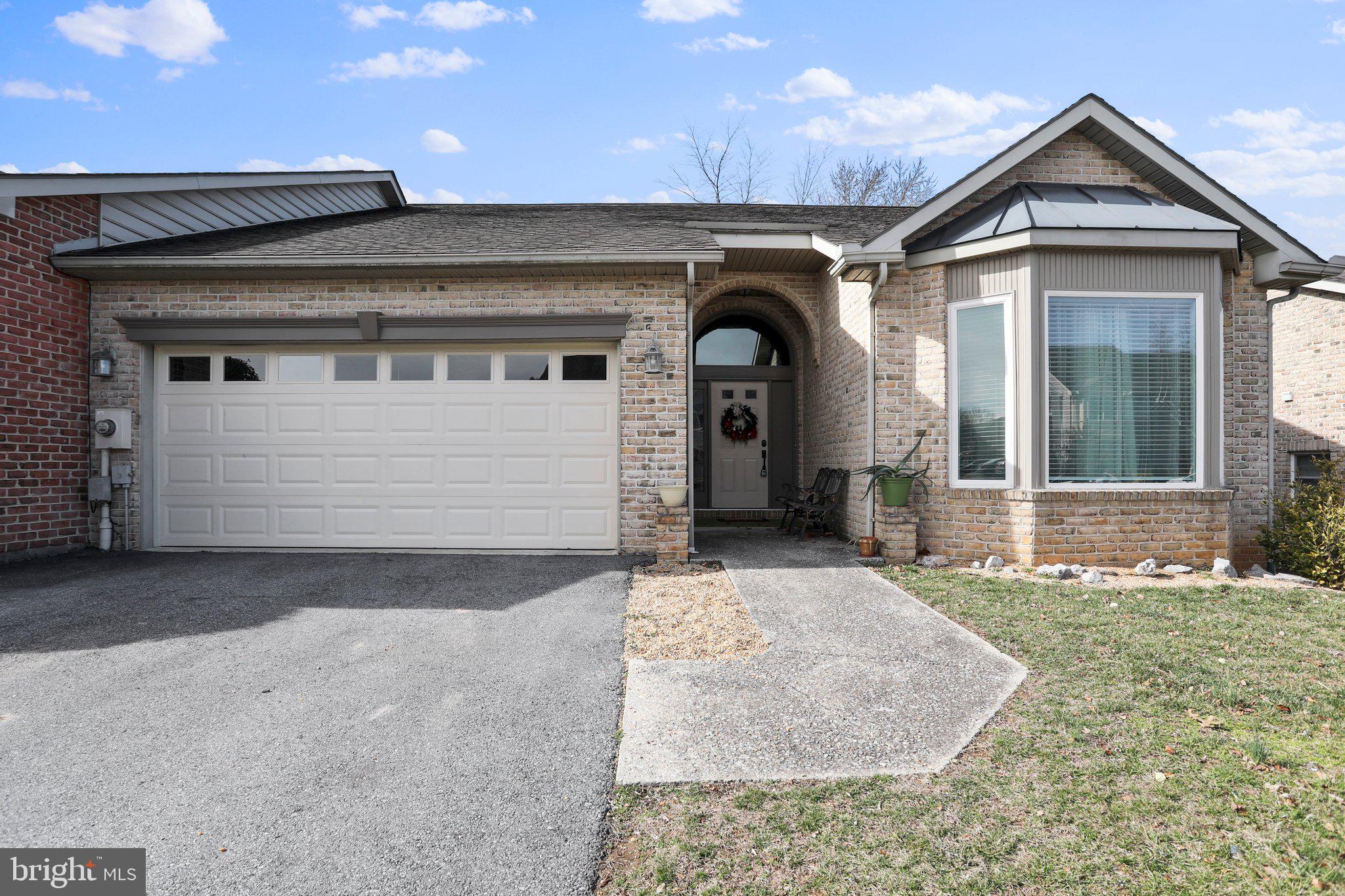 Kick out clause* Still accepting contracts*
Enjoy one level living in this updated end unit villa with a fenced in back yard with no one behind you in the desirable Spring Mills.
The home opens to a large foyer with hardwood floors and 11 ft ceilings. These features continue into the spacious living and dining rooms. The kitchen features all stainless appliances, quartz countertops, and a porcelain backsplash. The den room has hardwood, high ceilings, and a wood burning fireplace. It's great for those cold winter nights. The large master bedroom has vaulted ceilings, ceiling fan, and ensuite bath. The master bath has porcelain tile flooring and a custom-made vanity and linen storage. Luxury continues with the porcelain tile walk-in shower featuring a bench seat. A large walk-in closet w/ built-in shelving and drawers tops off the master suite. Bedroom 2 also has vaulted ceilings. A large bay window adds great charm. The guest bath has an updated vanity, vinyl floors, and a fiberglass bathtub. The laundry closet has shelving, and machines convey! The large garage has ample room for cars and storage. Whether you're upgrading from a rental or looking to retire on one level this home is a great fit for everyone. Don't miss out on this one! Call for your showing today!