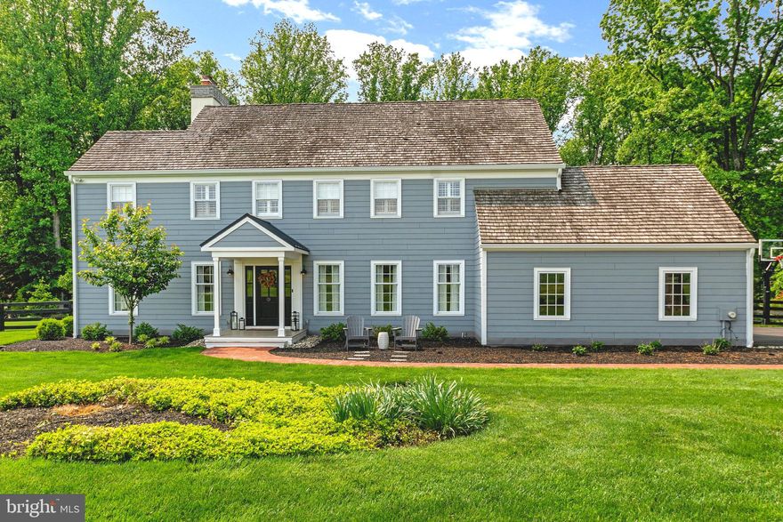 OFFERS DUE BY MONDAY 6/5 at 9 AM Welcome to this elegantly appointed home, situated on 5 beautiful acres located among a small enclave of houses in the very desirable Long Lane Farms.  Beyond the stately tree-lined driveway, a home featuring a bright and spacious, well-received floor plan awaits. This home includes an array of distinctive features and architectural details throughout. Quality artisanship and pride of ownership are hallmarks throughout this home as evident in the details. A simply beautifully appointed gourmet kitchen, which was remodeled in 2021 provides a light and airy ambiance. Boasting 42” cabinetry along with a custom center island featuring built in microwave and wine fridge, this kitchen is both stunning and functional.  A professional grade Monogram stove and exhaust system, durable granite countertops and backsplash, along with easy access to the Dining room is sure to delight any host. The lofty ceilings and custom millwork create great spaces to entertain in both the Living room and Dining room. The Dining room is completed with built-in cabinets and shelving.  A beautifully appointed Family room provides a great space to enjoy the latest mystery novel while relaxing by the fireplace. Here, walls of windows frame the newly landscaped backyard oasis with a large custom deck calling for barbecues in the expansive and well-manicured yard. This home is accented with 3 beautiful fireplaces and includes dual zoned HVAC added in 2021. The fully renovated Laundry Room is conveniently located on the main level and provides a handy utility sink along with inside access to the side-turned two car garage. A spacious powder room featuring granite and elegant fixtures completes this level. The second floor features a beautiful, spacious master bedroom with a completely updated private bath and fireplace. 3 wonderful additional bedrooms and a well-appointed full bath complete this level. The current owner remodeled the second floor in preparation for a third-floor master suite to be added in the future.  Plans included upon request. The current owner also added beautiful wood fencing to the rear of the property in 2021, front porch in 2021 and back deck in 2023. Zoned agricultural with Homestead approval providing this beautiful property with lower taxes.