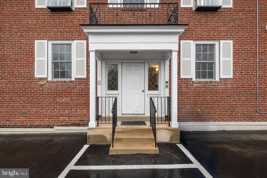 Gorgeous, rarely-available 4-br residence at the Mayflower Condominium in Bryn Mawr. Exceptional 'split' floor plan centered by a large living/dining room and contemporary eat-in/island kitchen. A large sunroom allows for additional flexibility and family space. To one side of the living room is the primary bedroom with en suite, travertine-clad bath with two separate vanities, oversized shower w/ frameless glass enclosure, and fitted walk-in closet/dressing room. Three additional, well proportioned bedrooms occupy the other side of the unit, along with a hall bath and separate laundry area. One indoor garage parking space and two significant basement storage rooms are included.  There is readily available parking directly outside your front door to accommodate extra cars/guests.  Short walk to the train station for easy access to the city, and walk-able to downtown Bryn Mawr and all the Main Line has to offer.