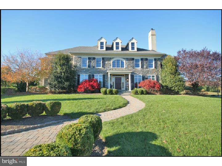From the moment you round the bend on Whitegate Rd and capture a glimpse of this majestic stunner, you will agree that the position of this house on its lot and within the community make this a statement property within the desirable Whitegate community. No detail was overlooked in the selection of this home from the lot location to the finishes throughout. Enter into the grand foyer and you will find hardwoods throughout the entire first floor, extensive millwork throughout, generously sized rooms. The Pi ce de r sistance of the home is the family room with its walls of windows and floor-to-ceiling stone fireplace. The gourmet kitchen features maple cabinetry and designer appliances, an island and a peninsula as well as a large walk-in pantry and butler pantry with wine and beverage refrigerators. Large formal LR and DR have upgraded millwork. There are gas FPs in the LR and FR. The main level has front and back staircases and everyday and formal powder rooms. A large mudroom with cubbies and additional closets is right inside the side entry or garage access. There is a formal study smartly positioned behind the living room for privacy. The bedroom level features hardwoods in the hallways, large master bedroom suite with dressing area and large bathroom suite. Front and back bedrooms each have Jack-and-Jill bathrooms. The lower level is finished with care and multiple use spaces and a full bathroom. For outdoor summer fun there is a 20x40 pool surrounded by substantial hardscaping and extensive landscaping for privacy. Regal, majestic, magnificent, aren't these suitable adjectives to describe your next castle?