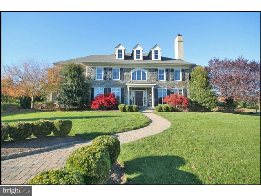 From the moment you round the bend on Whitegate Rd and capture a glimpse of this majestic stunner, you will agree that the position of this house on its lot and within the community make this a statement property within the desirable Whitegate community. No detail was overlooked in the selection of this home from the lot location to the finishes throughout. Enter into the grand foyer and you will find hardwoods throughout the entire first floor, extensive millwork throughout, generously sized rooms. The Pi ce de r sistance of the home is the family room with its walls of windows and floor-to-ceiling stone fireplace. The gourmet kitchen features maple cabinetry and designer appliances, an island and a peninsula as well as a large walk-in pantry and butler pantry with wine and beverage refrigerators. Large formal LR and DR have upgraded millwork. There are gas FPs in the LR and FR. The main level has front and back staircases and everyday and formal powder rooms. A large mudroom with cubbies and additional closets is right inside the side entry or garage access. There is a formal study smartly positioned behind the living room for privacy. The bedroom level features hardwoods in the hallways, large master bedroom suite with dressing area and large bathroom suite. Front and back bedrooms each have Jack-and-Jill bathrooms. The lower level is finished with care and multiple use spaces and a full bathroom. For outdoor summer fun there is a 20x40 pool surrounded by substantial hardscaping and extensive landscaping for privacy. Regal, majestic, magnificent, aren't these suitable adjectives to describe your next castle?