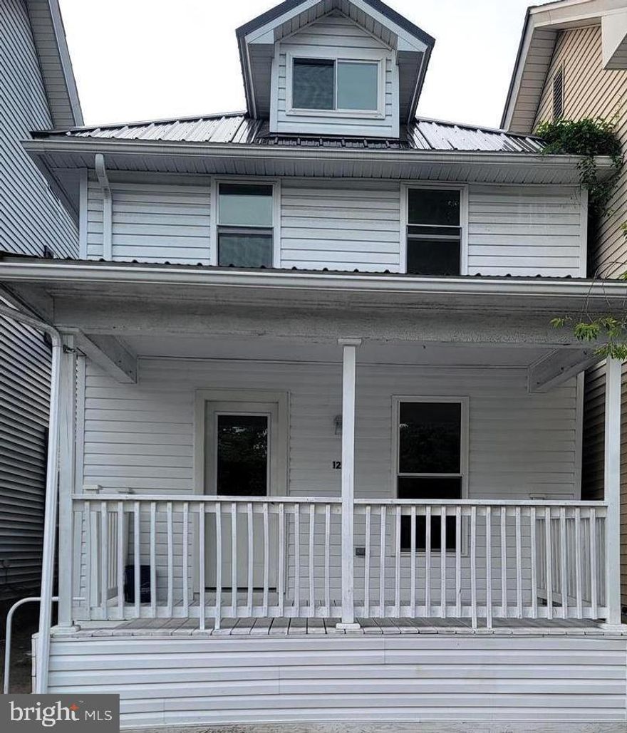 Recently updated two story in the small town of New Bloomfield, West Perry School District. Three nice size bedrooms, one and a half baths, newer carpet just shampooed. All new windows, insulation, drywall, wiring and a new metal roof. You can waltz right in without a car in the world and call this home.  Fenced in private back yard and even a place to park your cars out back, if you'd like. Large open floor plan on the first floor, great for hosting holidays and plenty of cabinet space you will find in this spacious kitchen with white cabinets and black knobs. First floor laundry and even room for a freezer if needed. New vinyl siding to make her look oh so pretty. Listing agent is owner of the property and please make sure when you submit contract it is stated in the last page of contract.